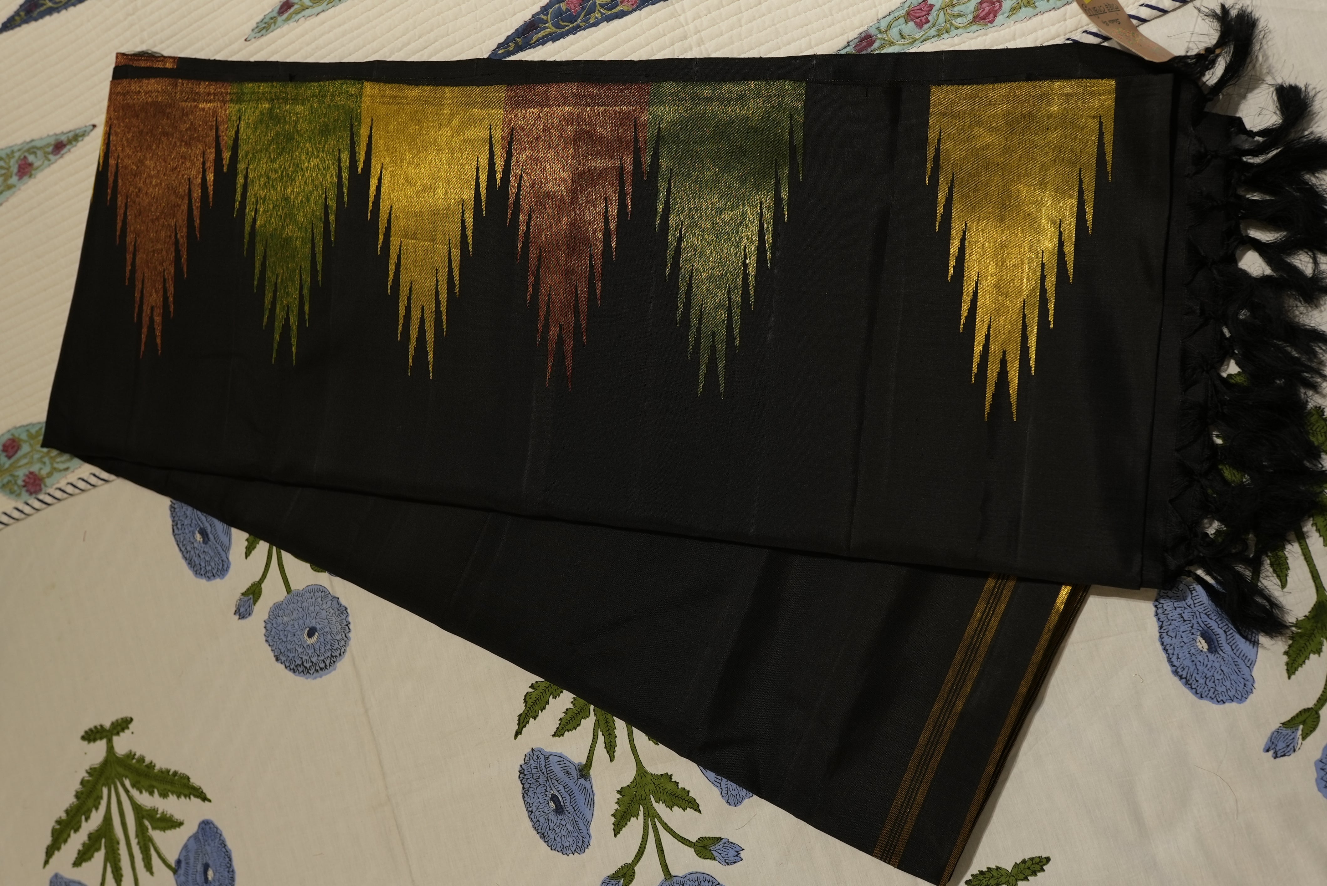 Black kanjiwaram saree with zari temple boarder