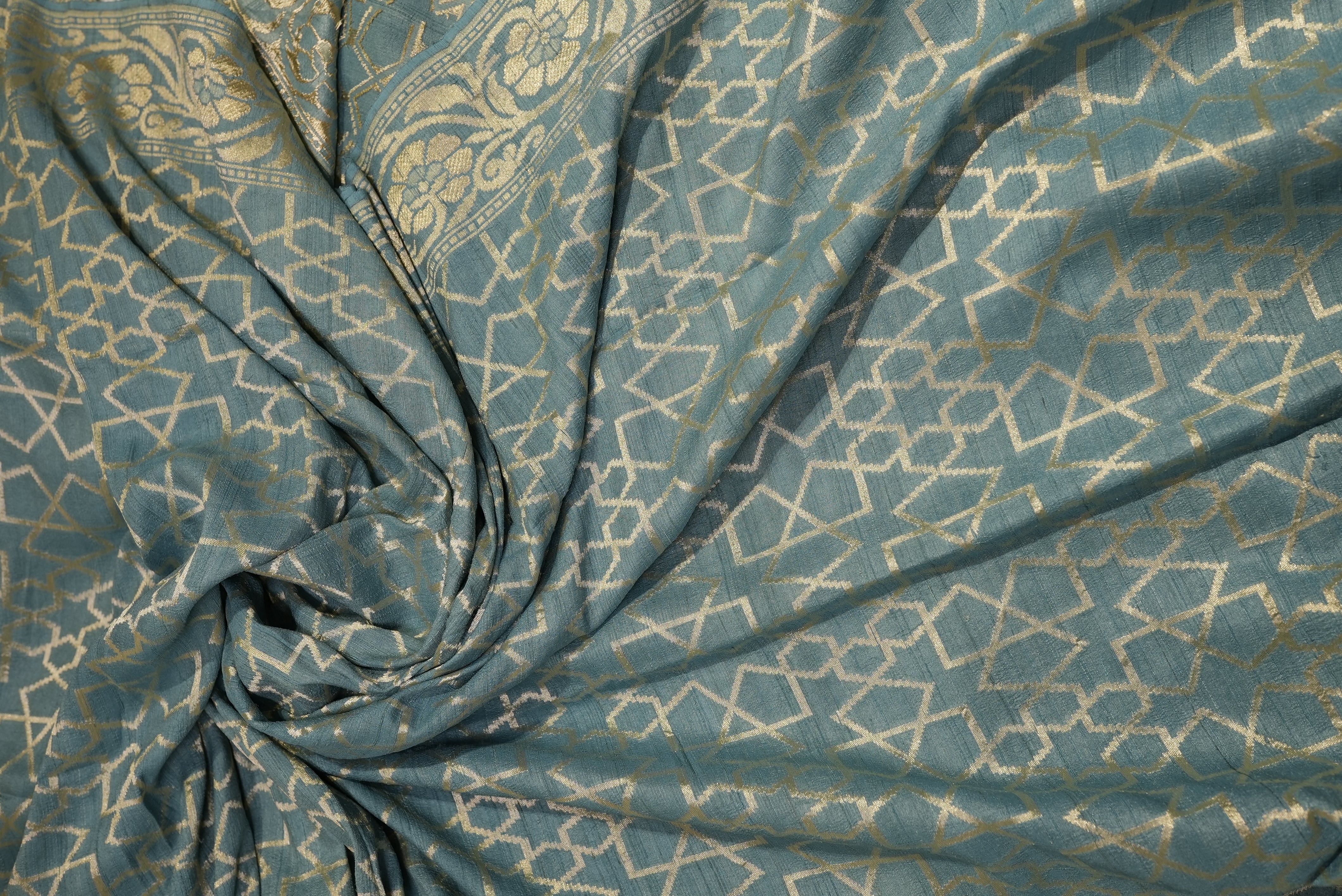 Blue tassar silk with beautiful zari floral boarder