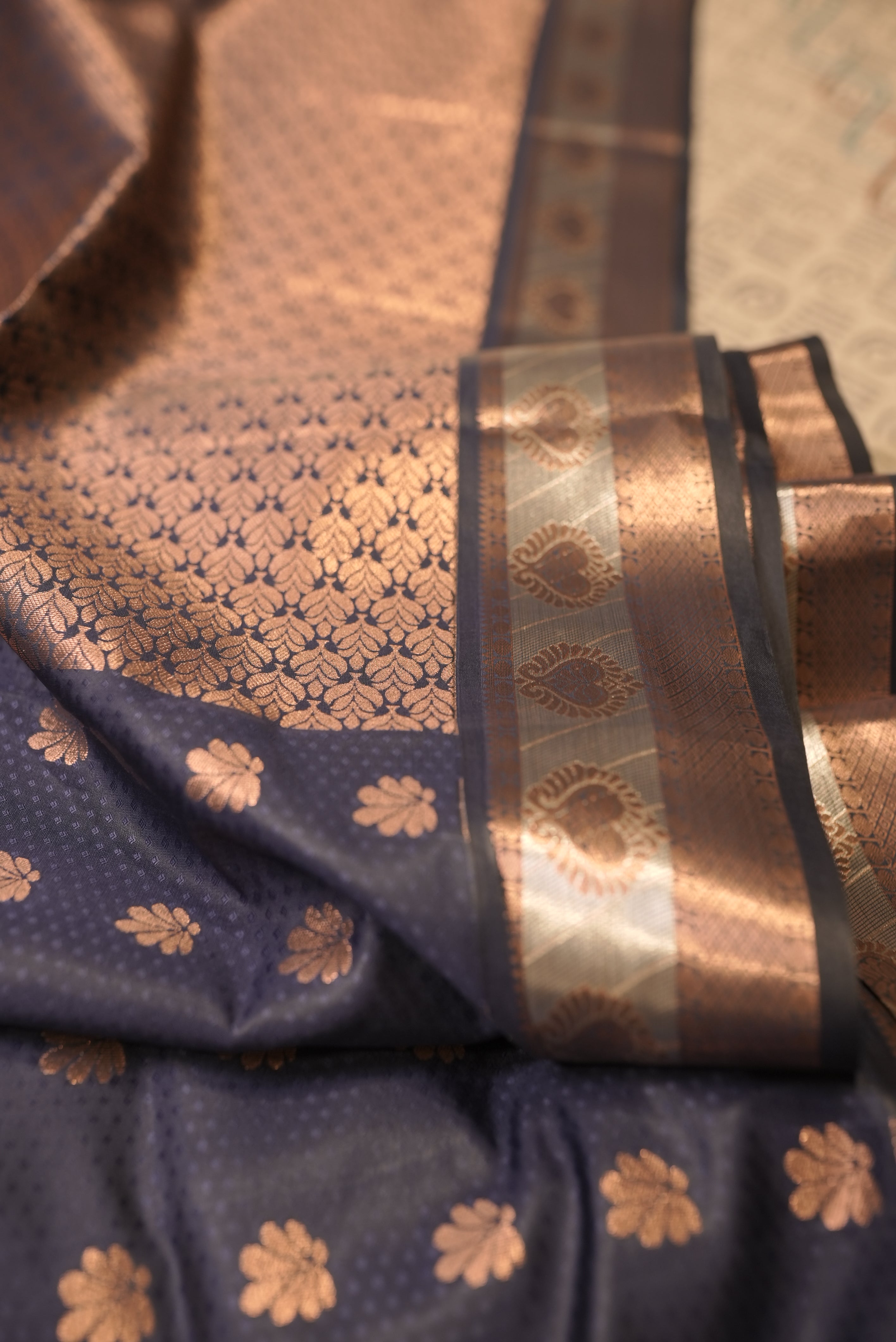 Dark blue with copper zari kanjiwaram