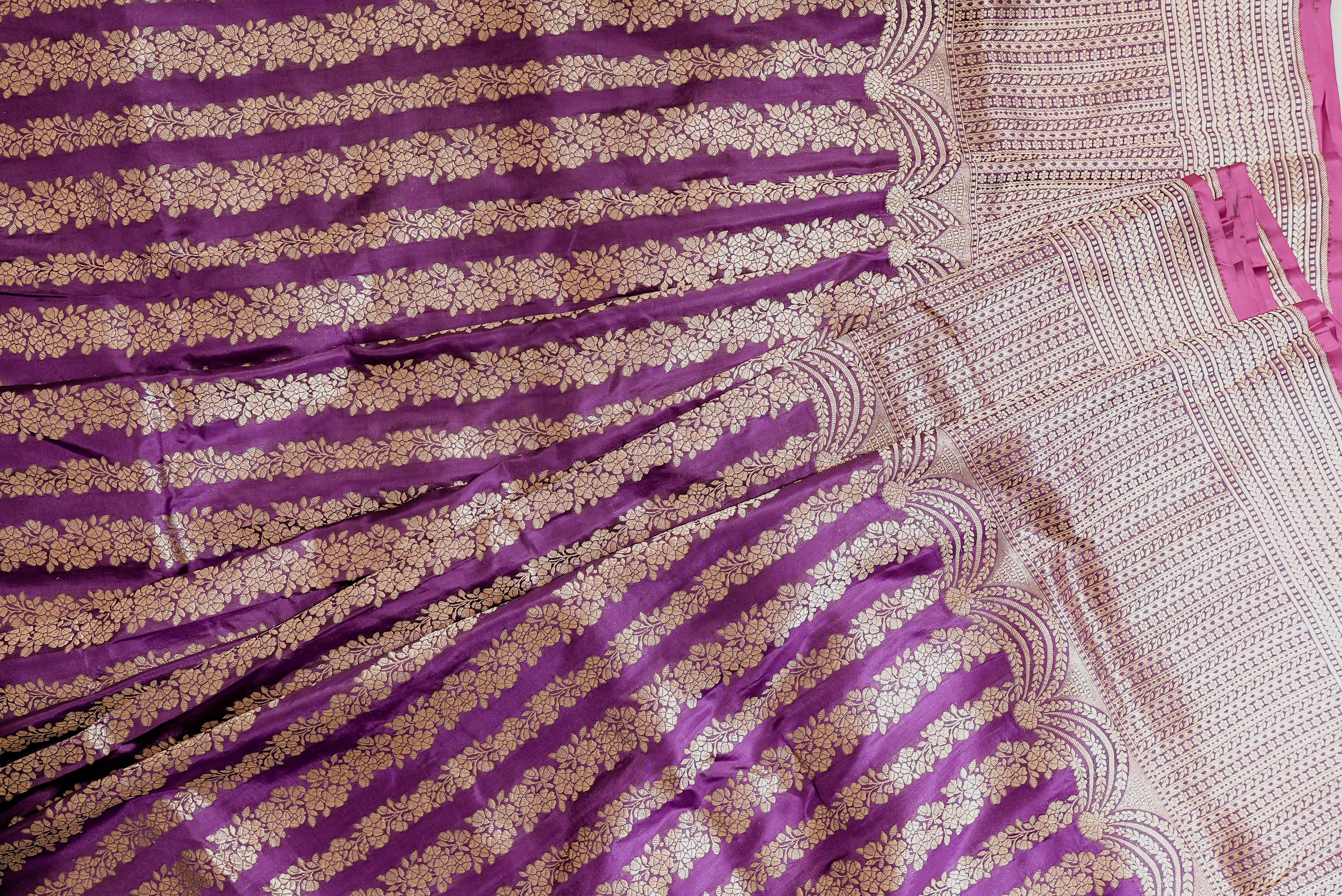 Purple banarasi saree with gold zari motifs and boarder