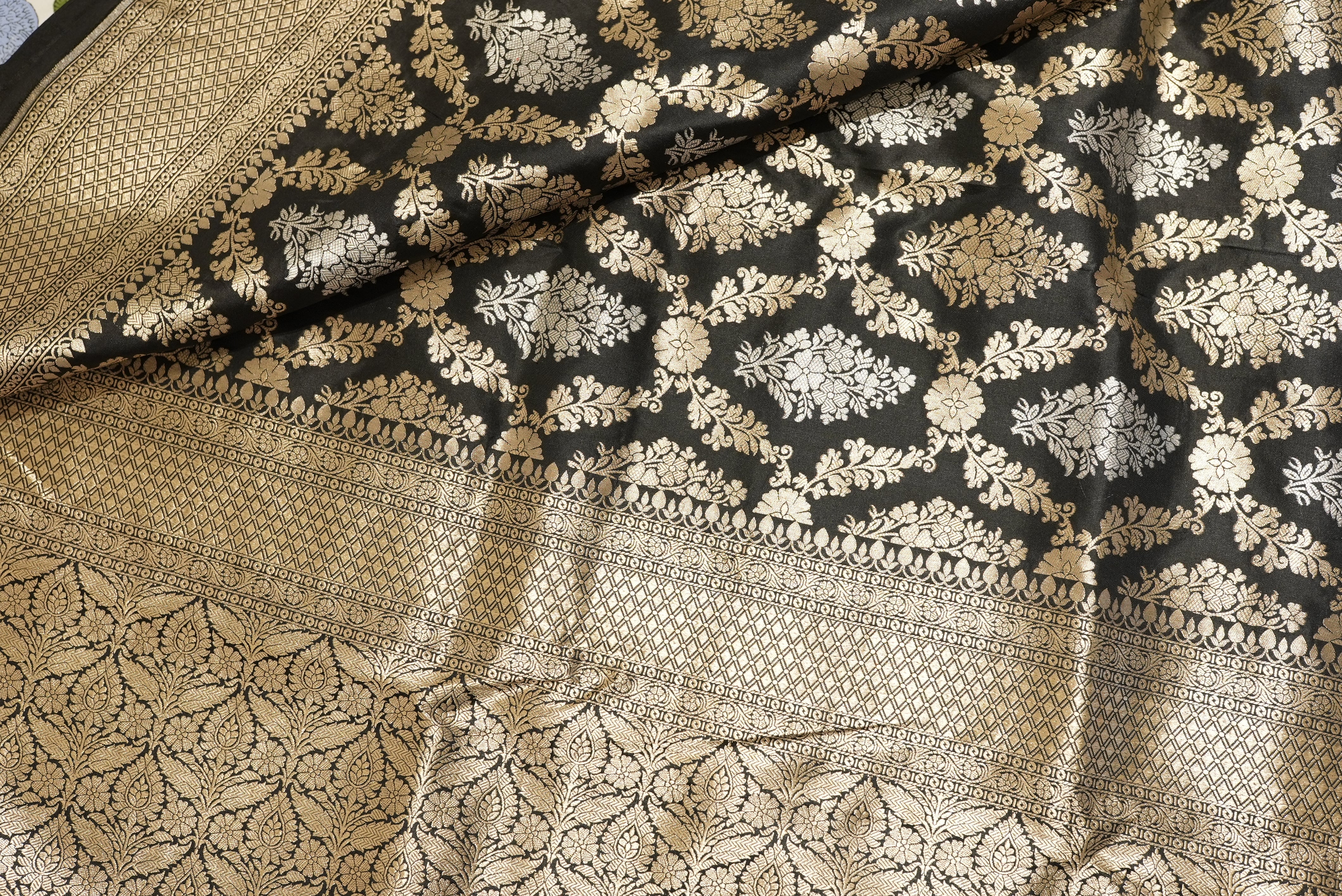 Black banarasi saree with zari motifs and boarder