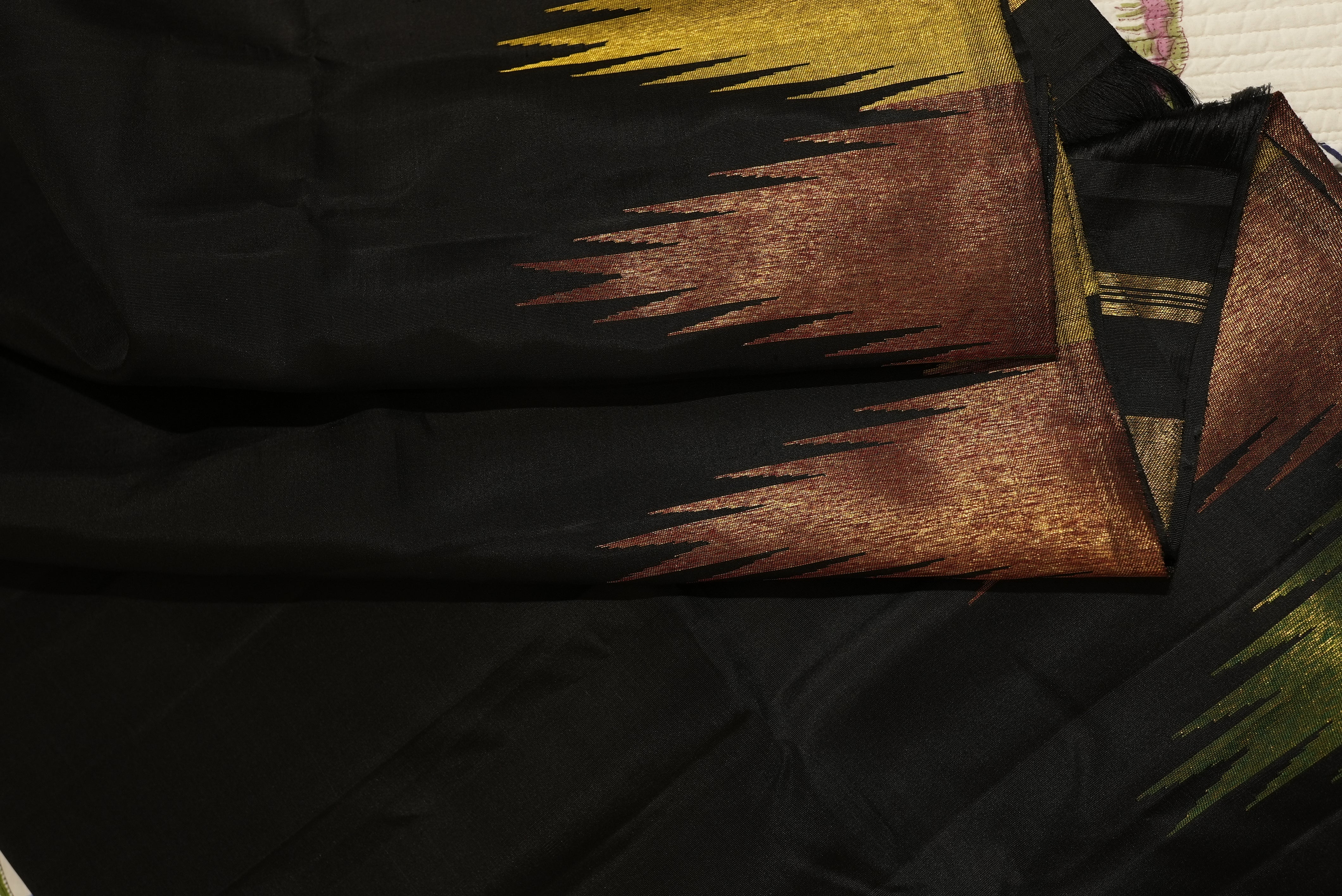 Black kanjiwaram saree with zari temple boarder