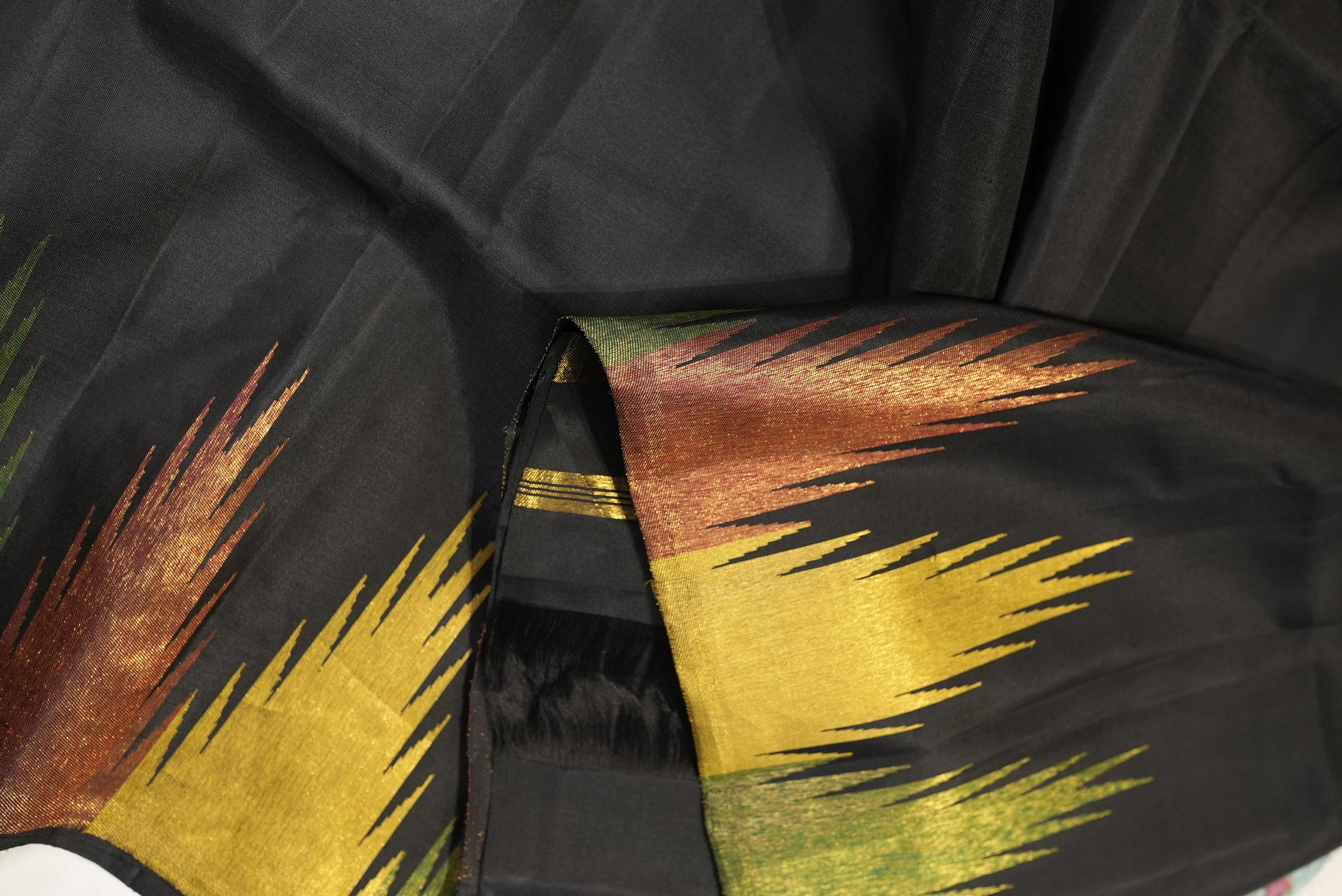 Black kanjiwaram saree with zari temple boarder