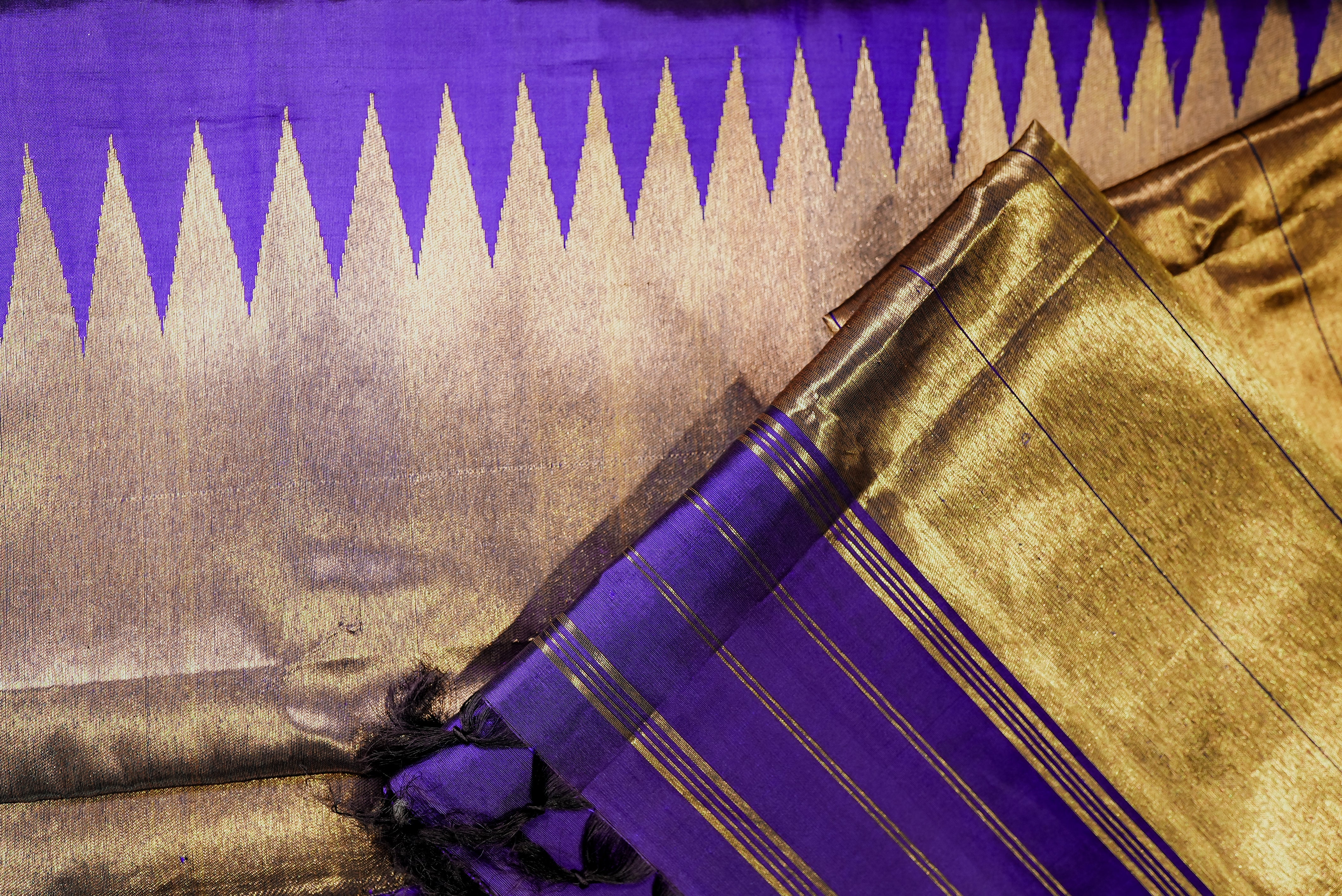 Purple kanjiwaram with golden rising boarder