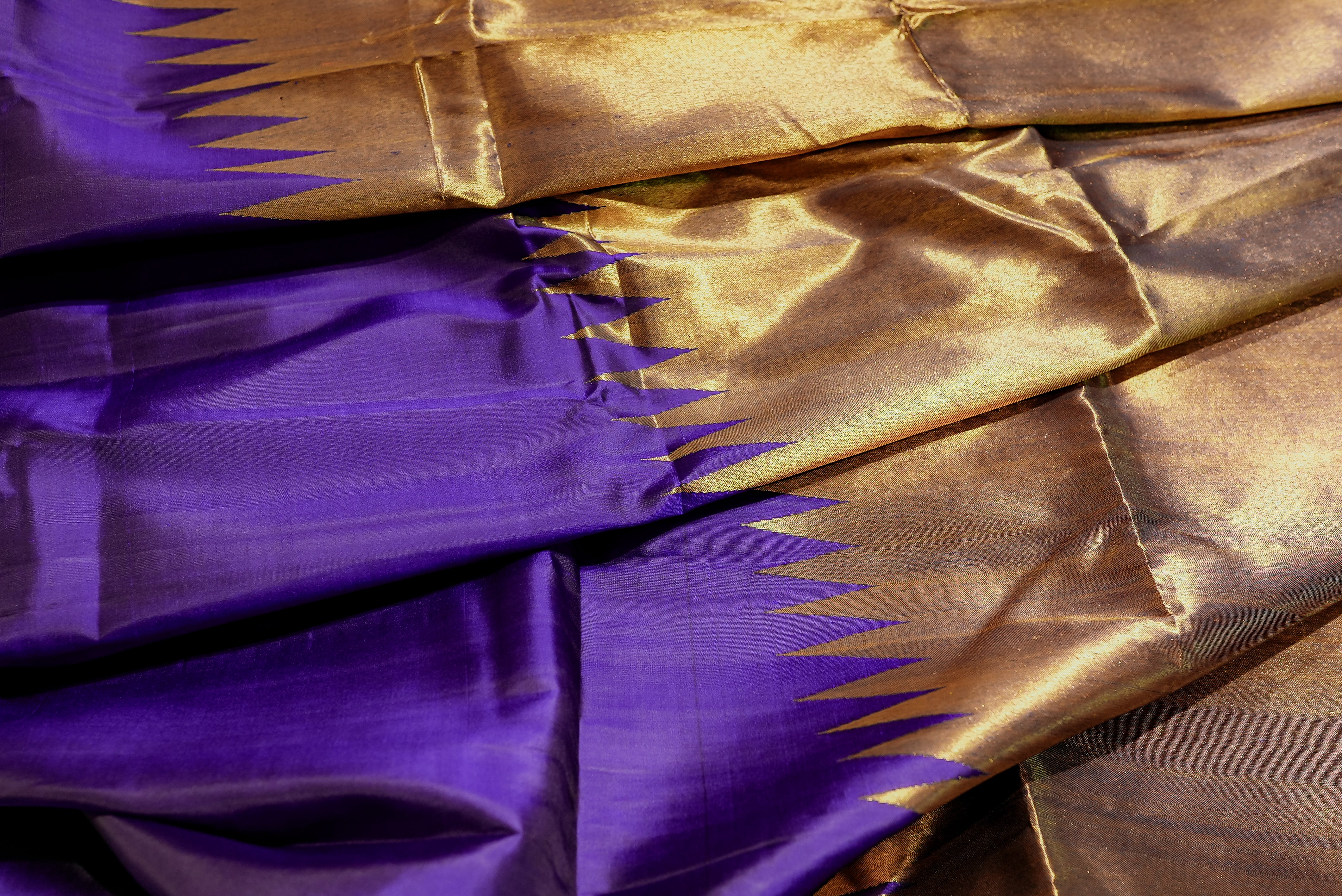 Purple kanjiwaram with golden rising boarder