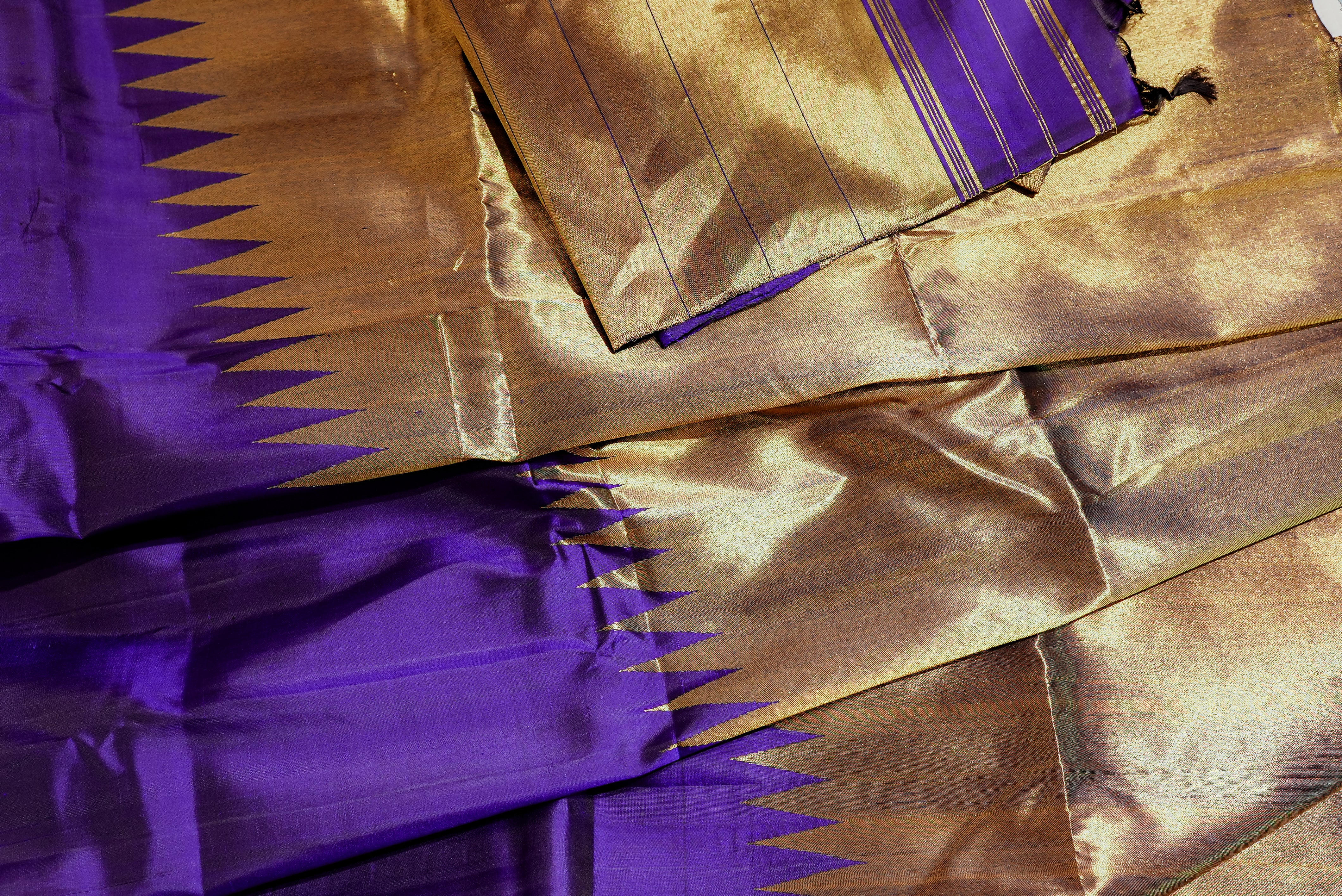 Purple kanjiwaram with golden rising boarder