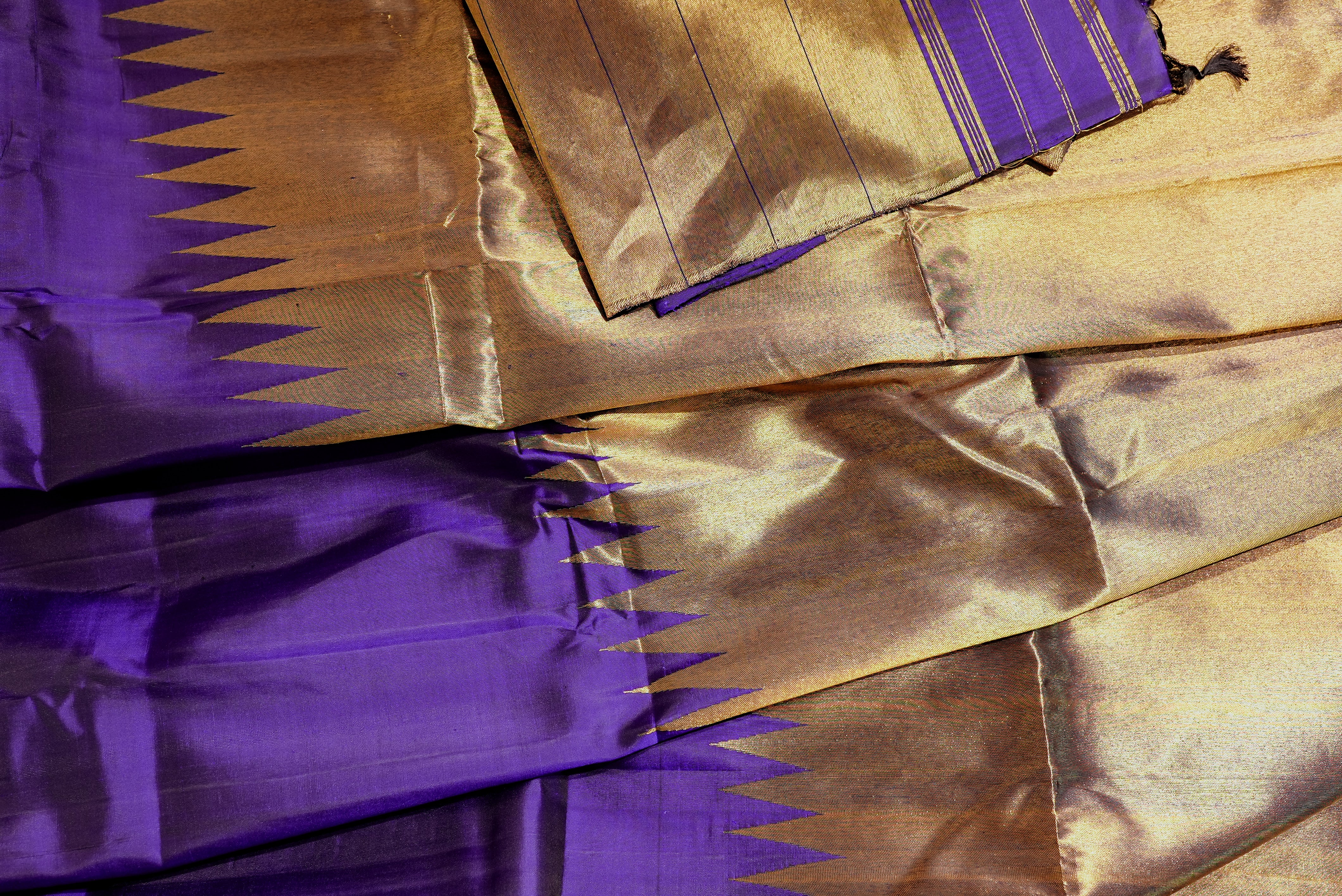 Purple kanjiwaram with golden rising boarder