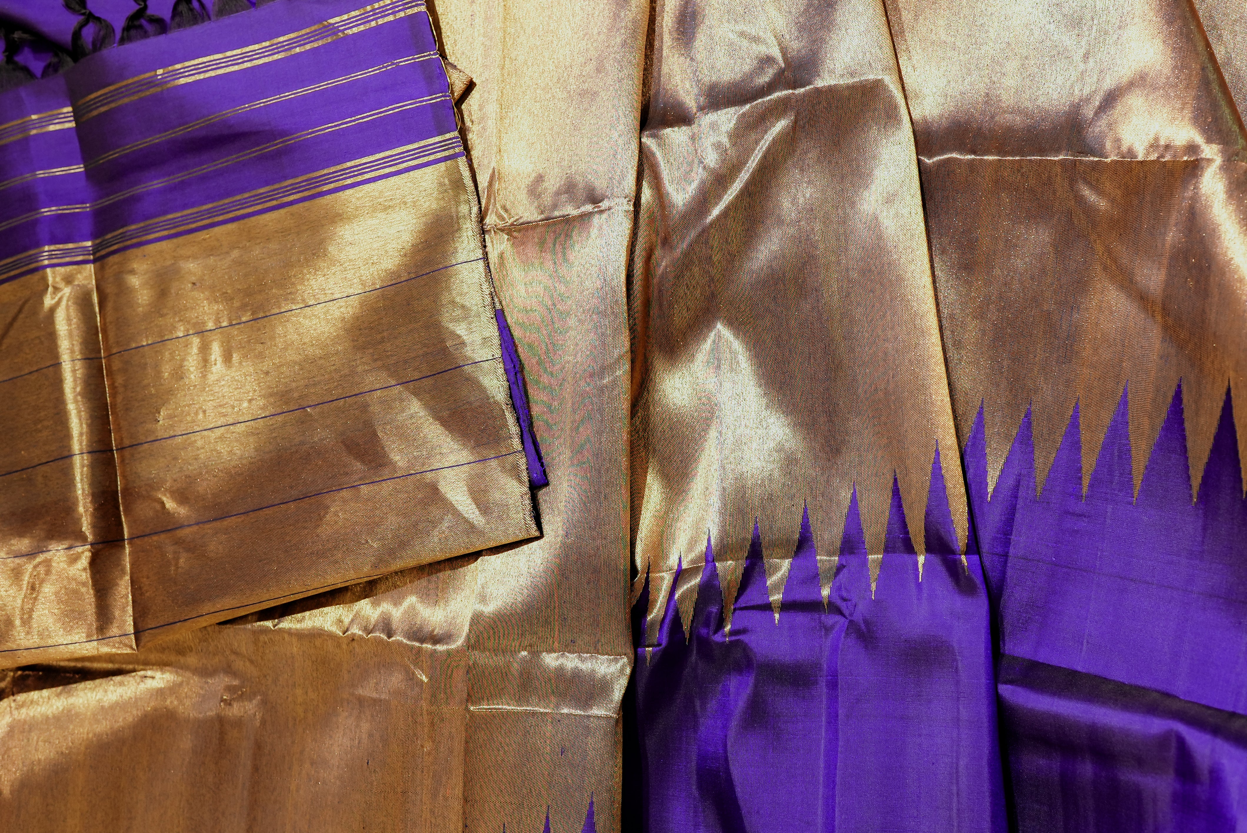 Purple kanjiwaram with golden rising boarder