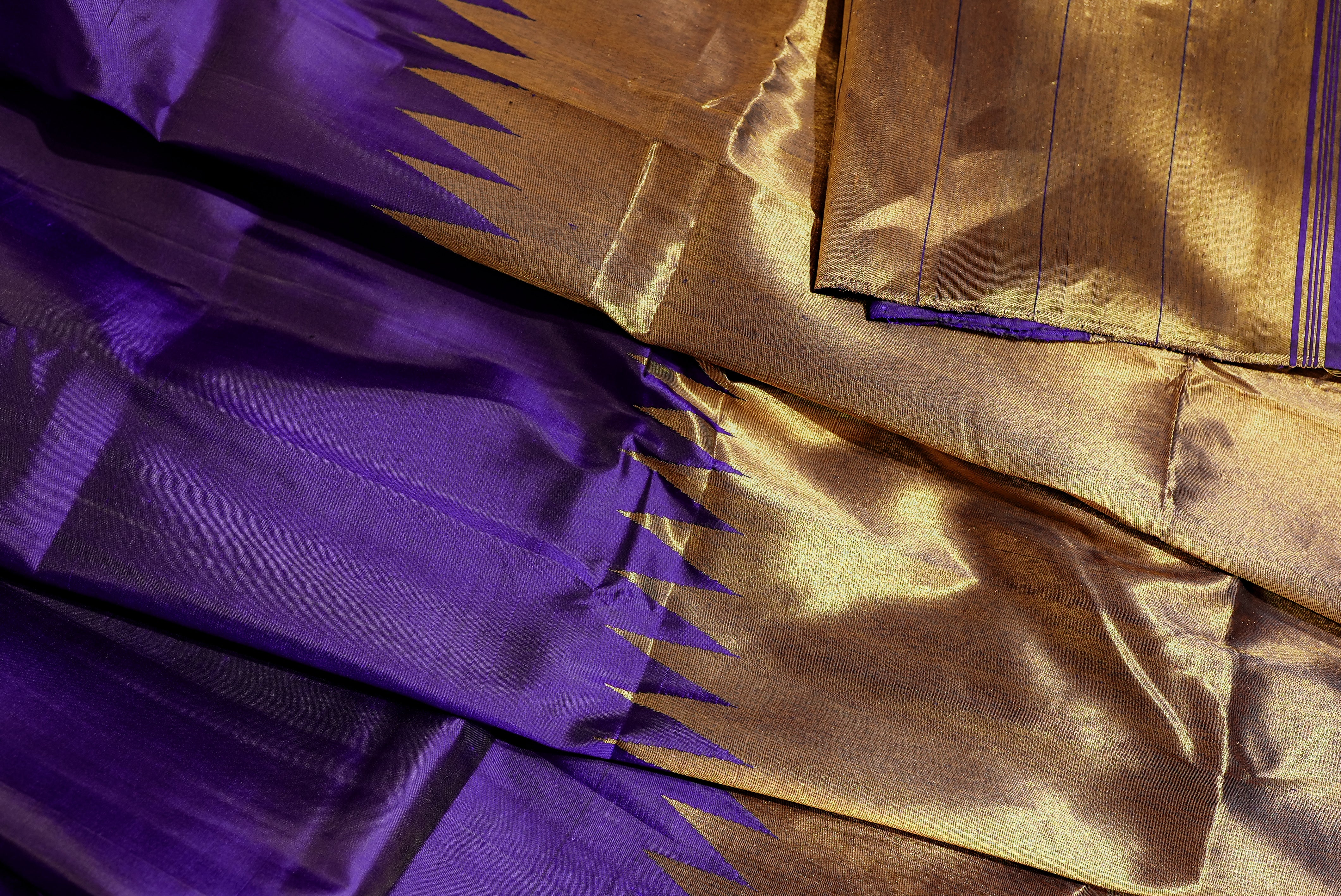 Purple kanjiwaram with golden rising boarder
