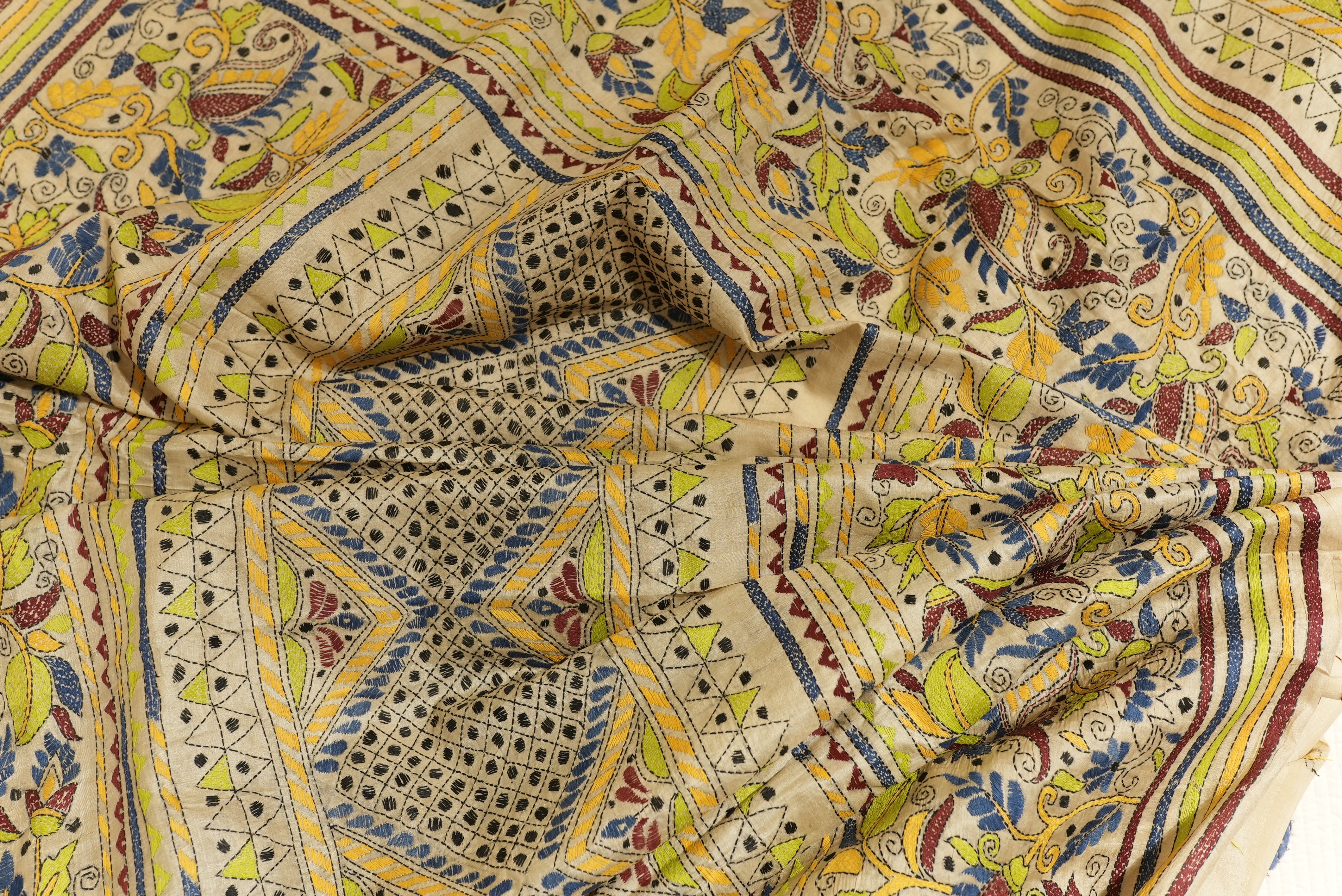 Beige tassar saree with full kantha work