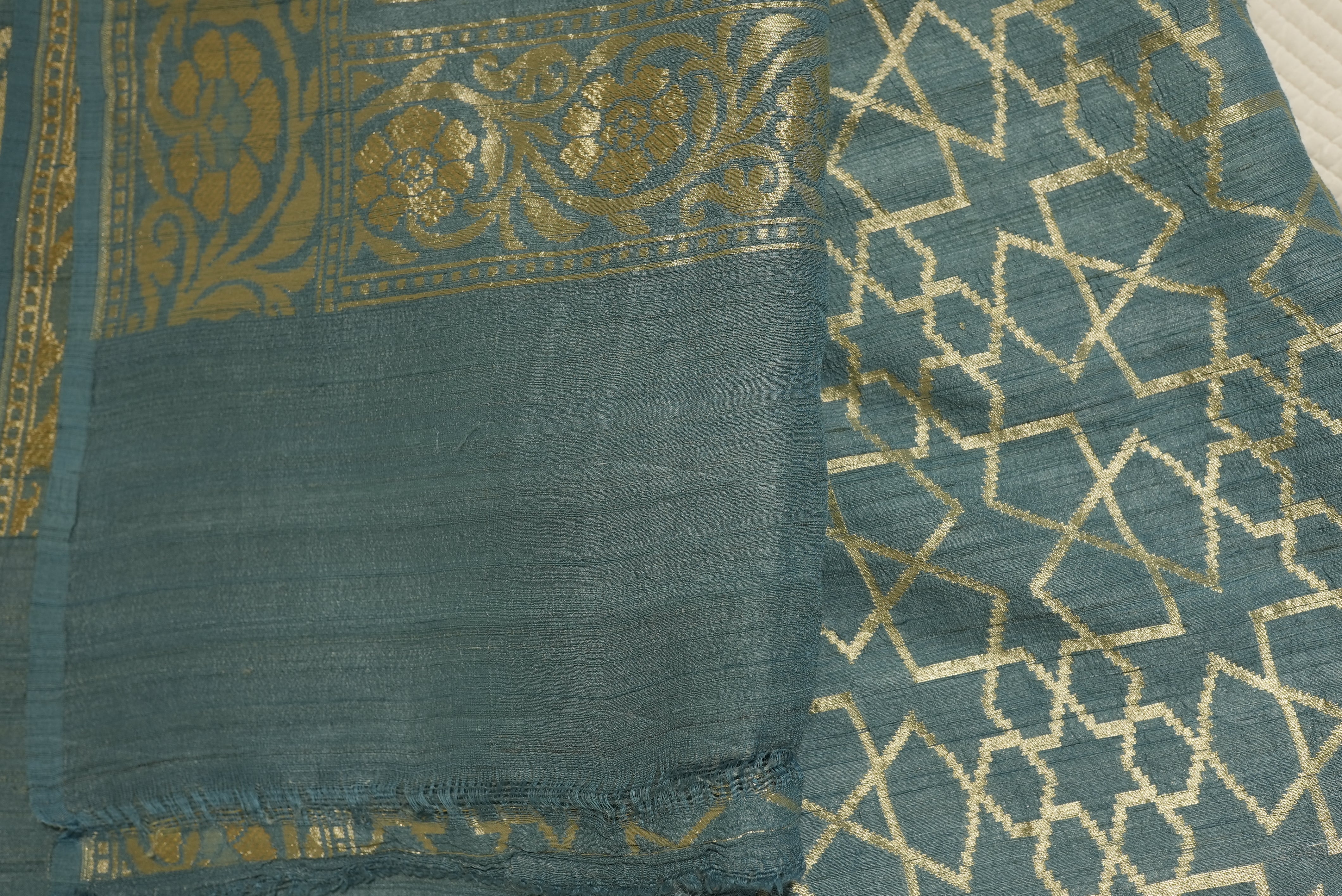 Blue tassar silk with beautiful zari floral boarder