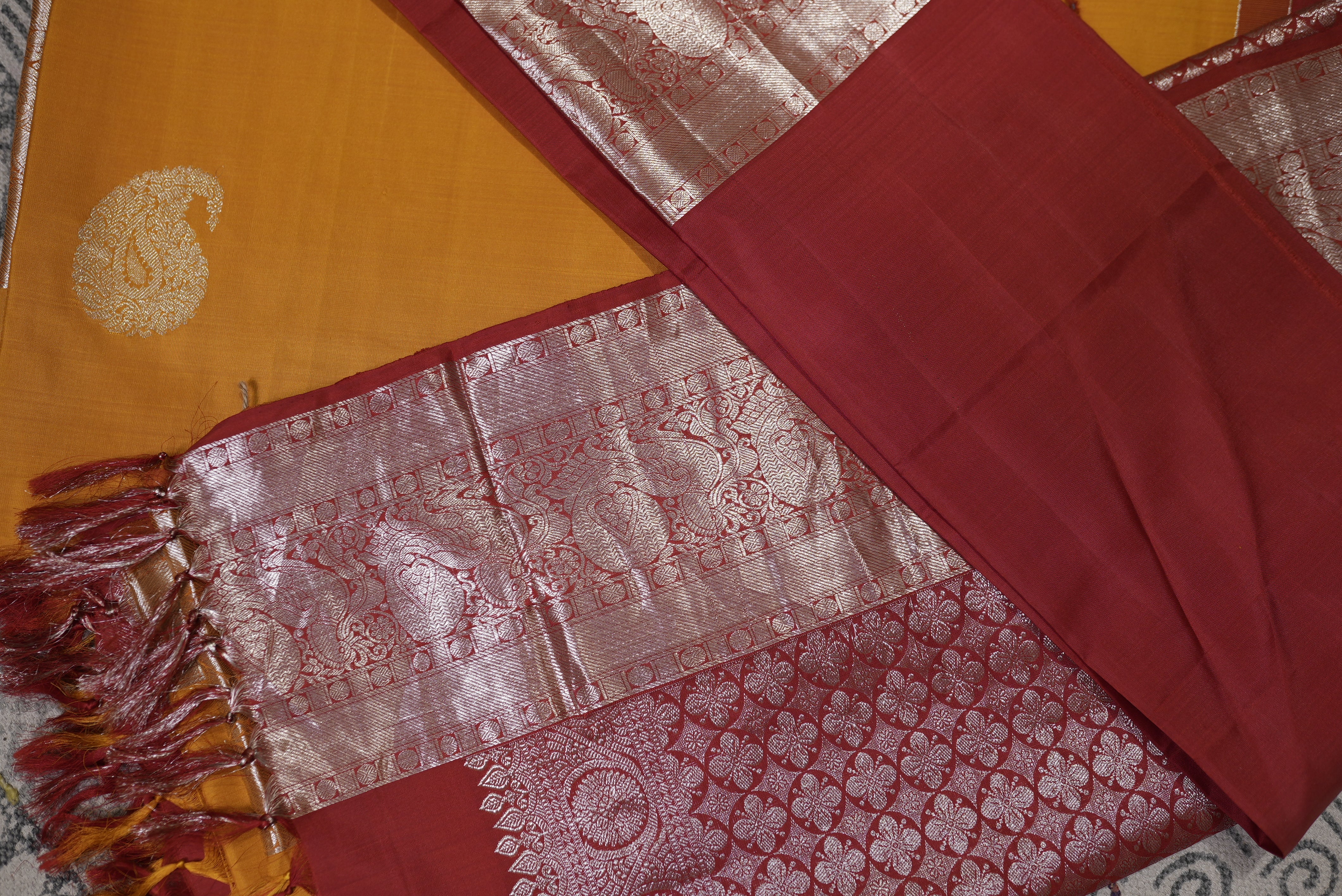 Yellow with red boarder kanjiwaram saree