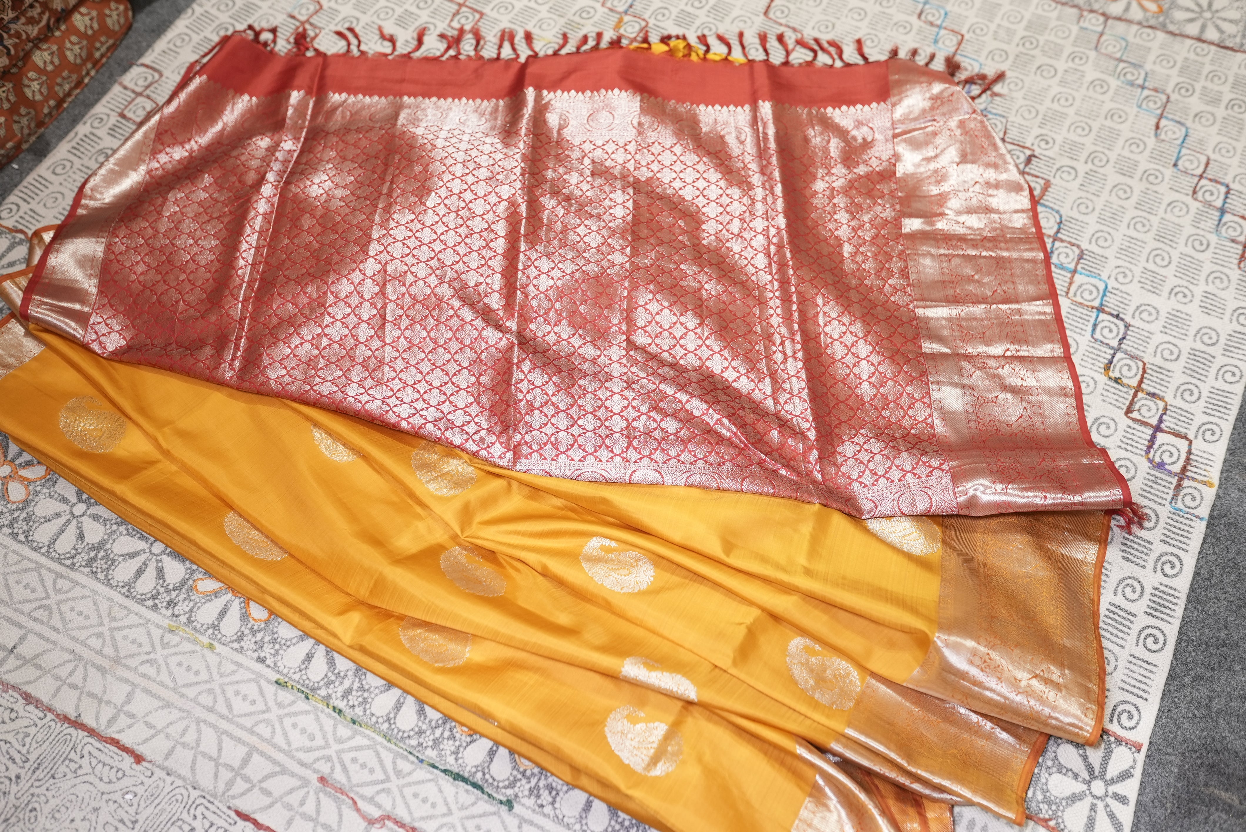 Yellow with red boarder kanjiwaram saree
