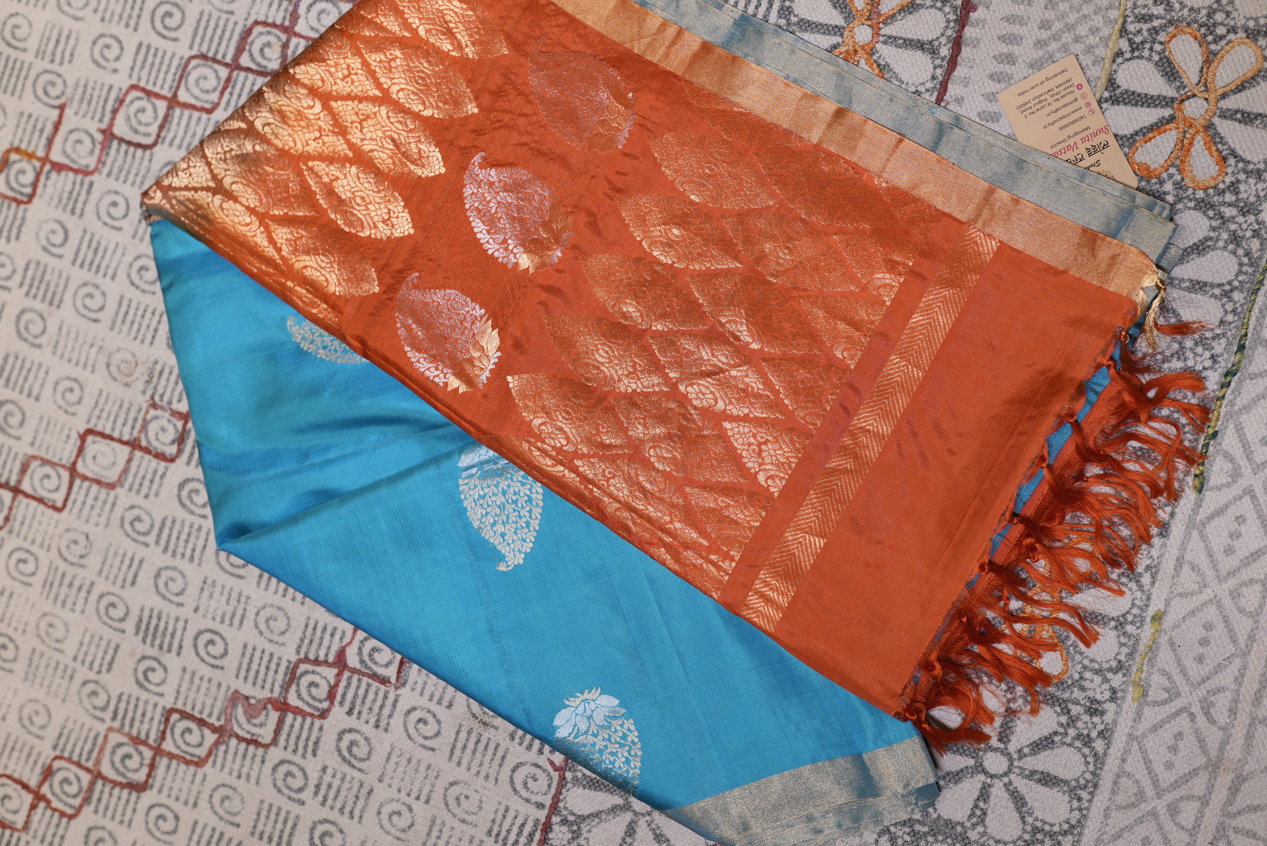 Sky blue with orange boarder kanjiwaram