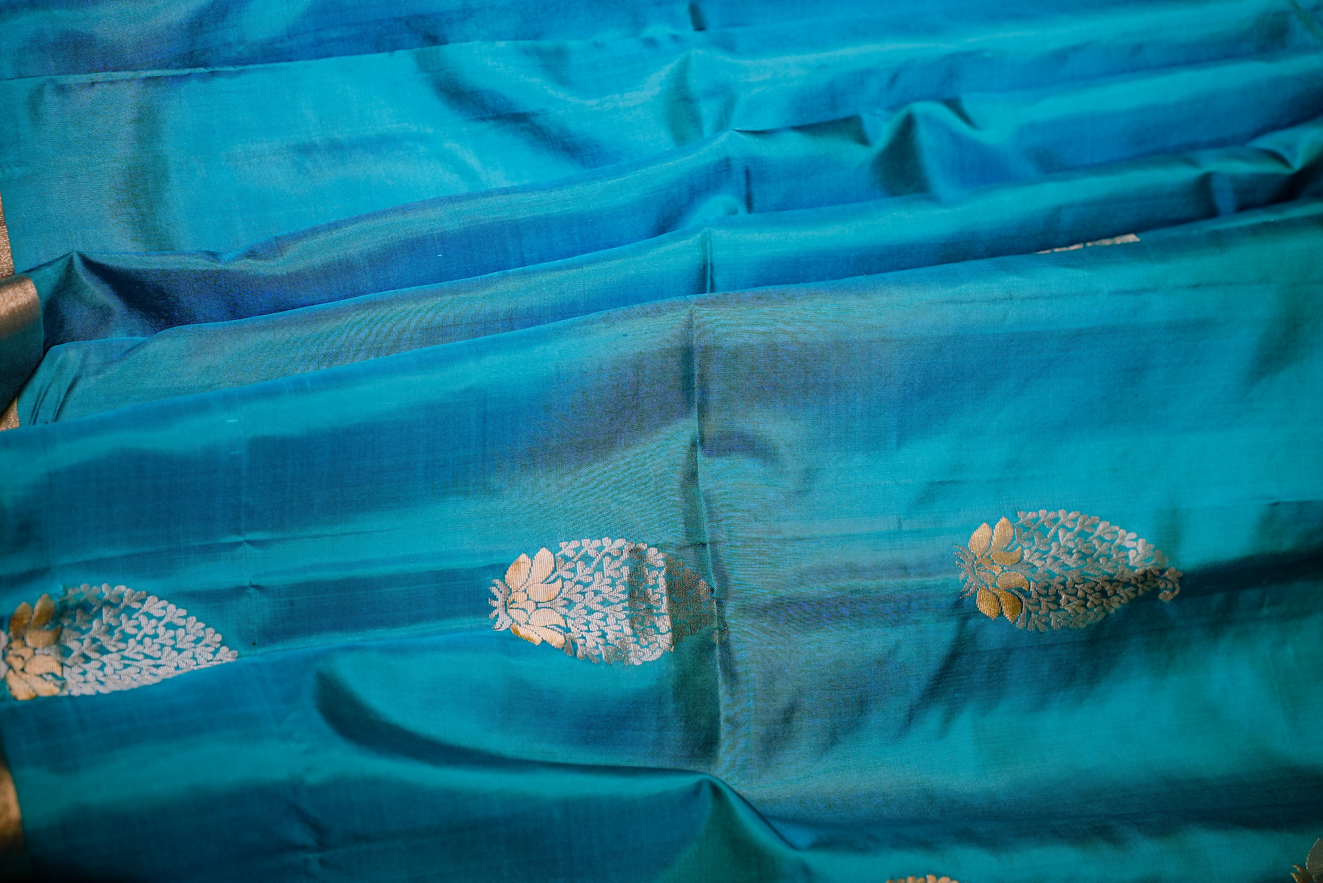 Blue with orange boarder banarasi