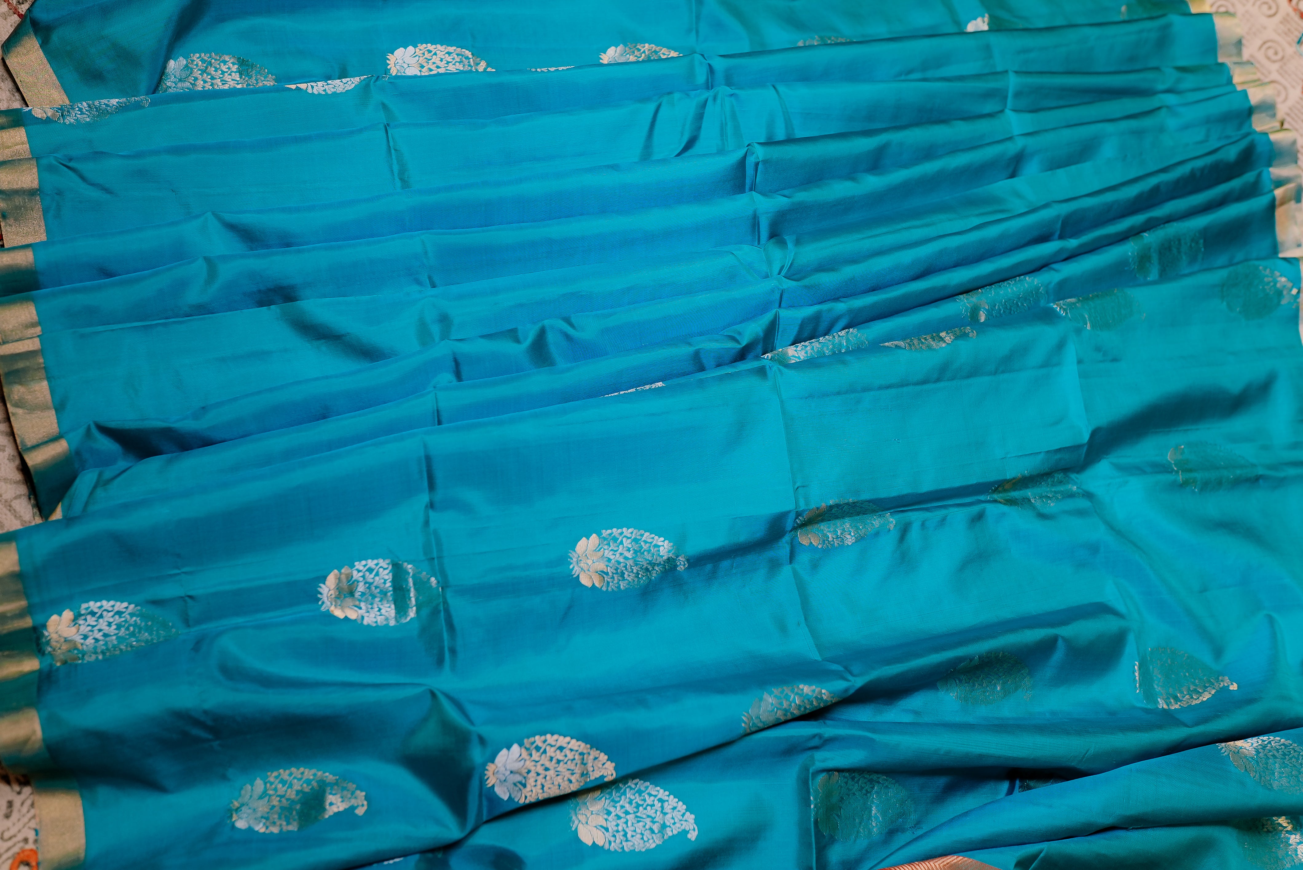 Blue with orange boarder banarasi