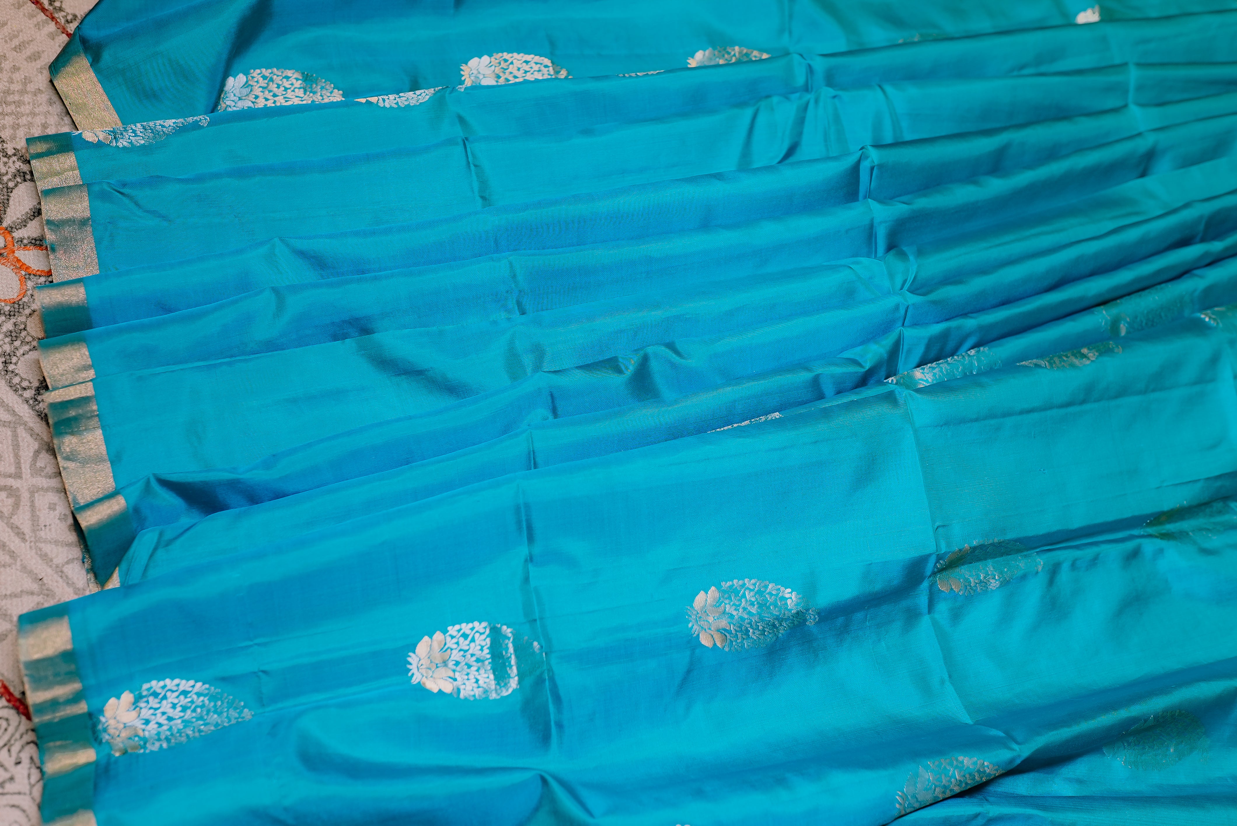 Blue with orange boarder banarasi