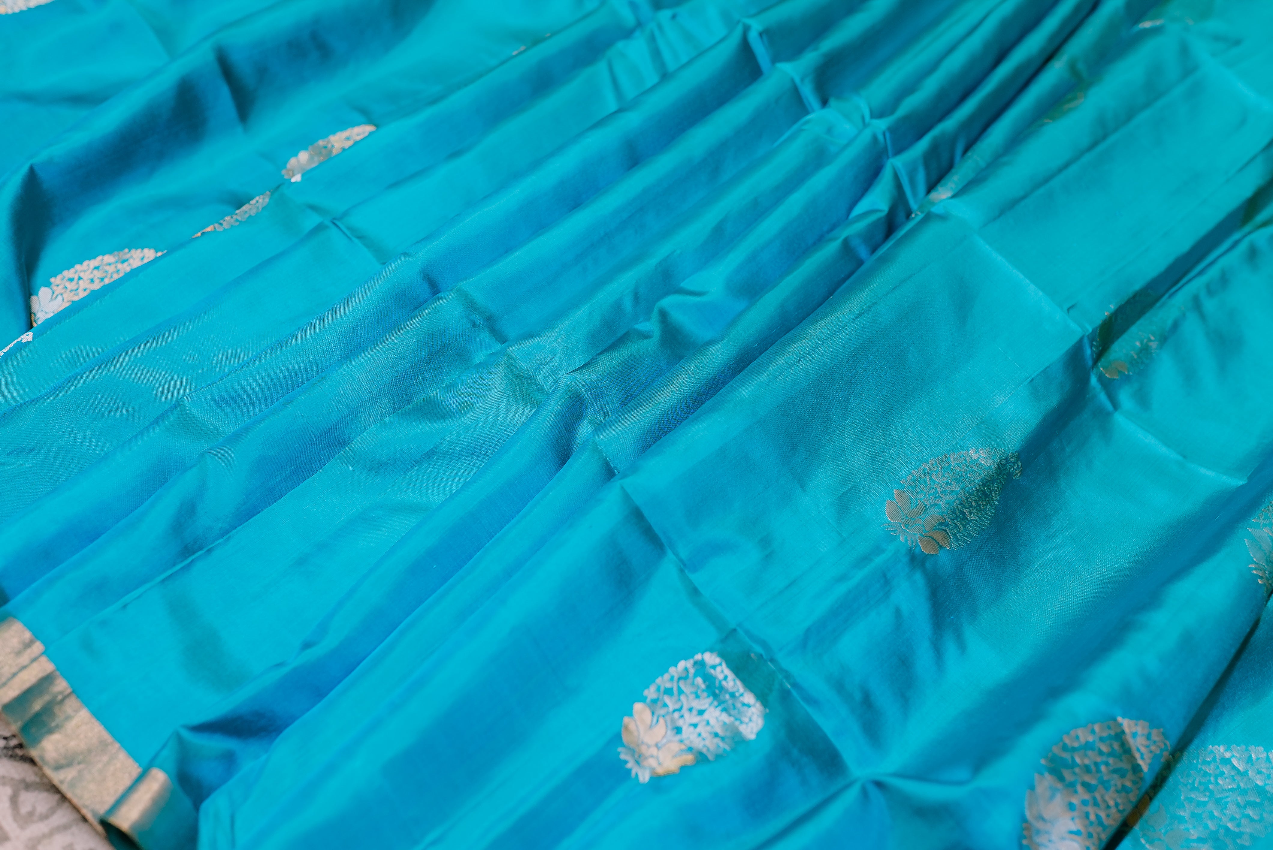 Blue with orange boarder banarasi