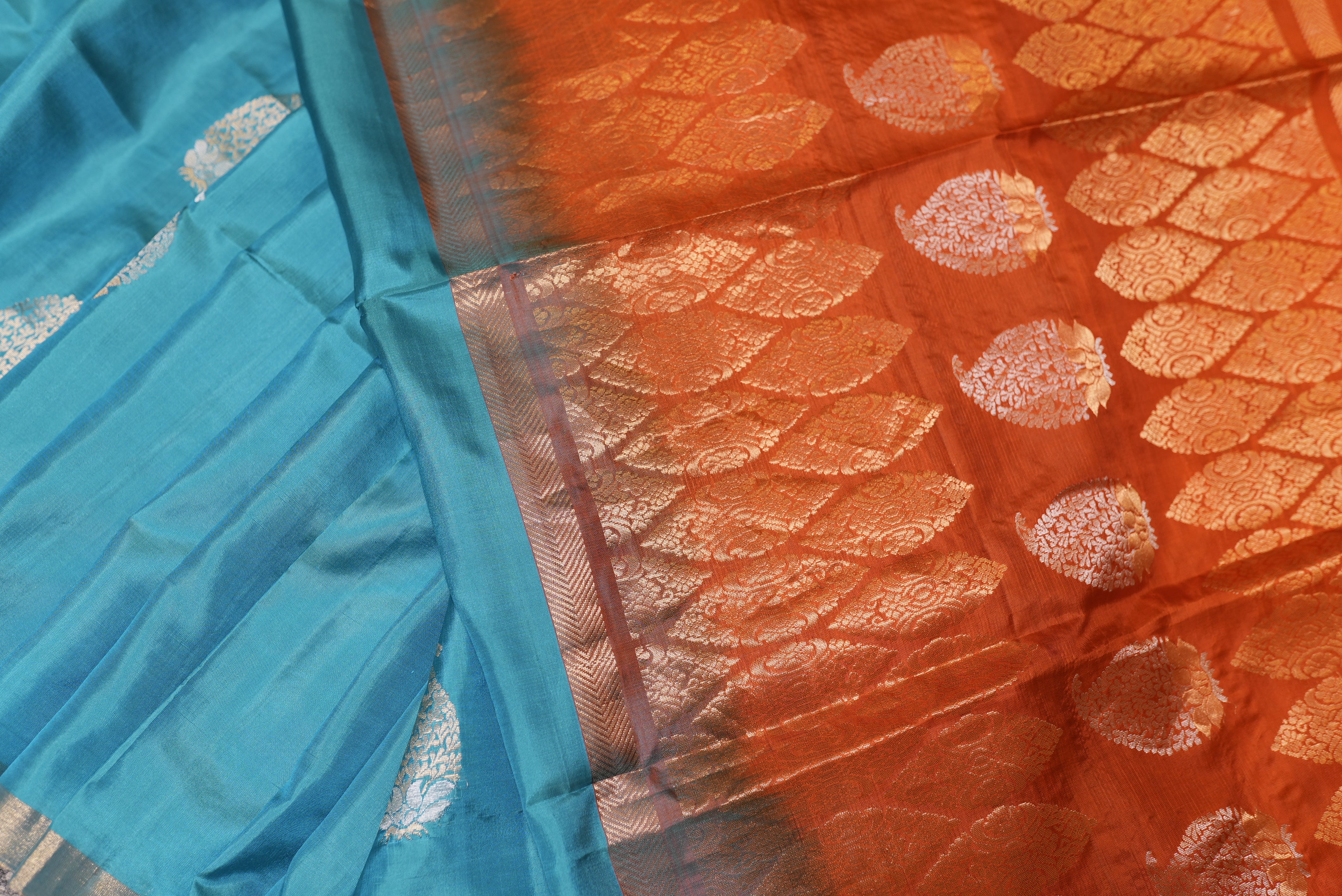 Sky blue with orange boarder kanjiwaram