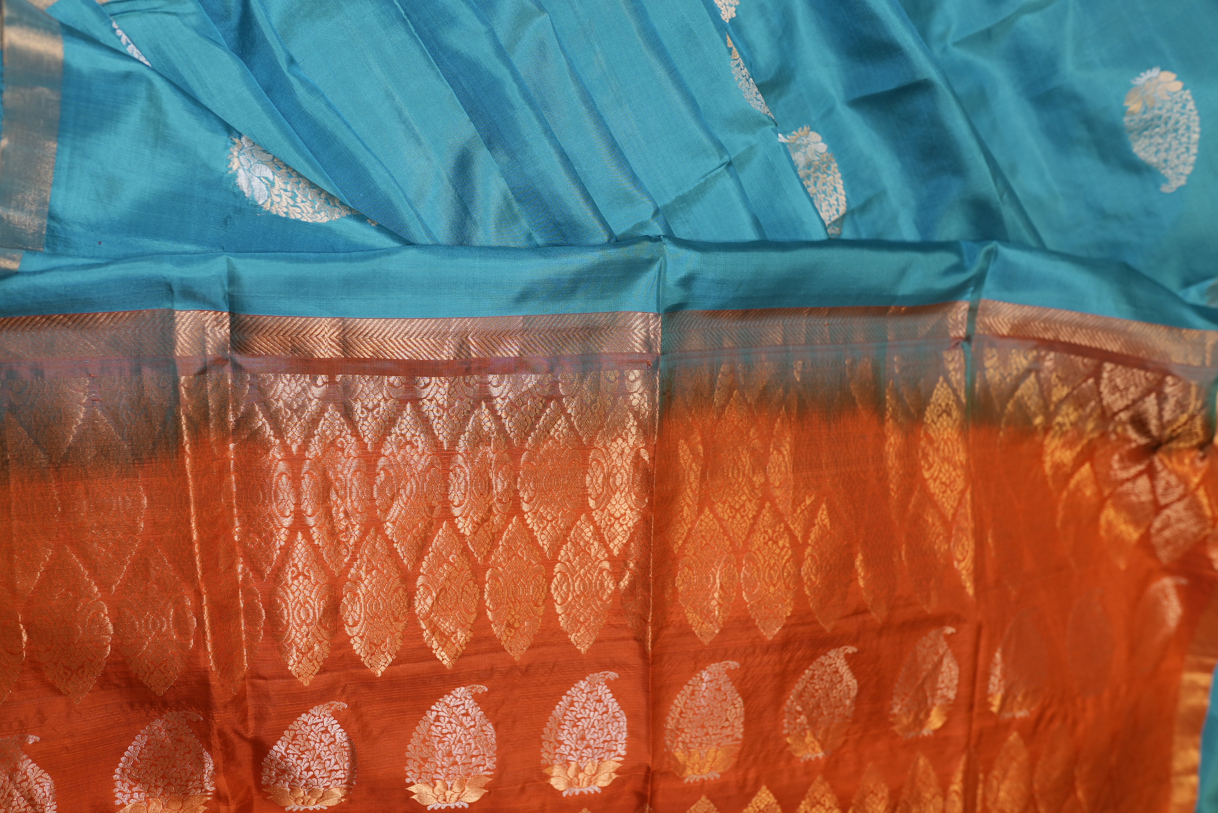 Sky blue with orange boarder kanjiwaram