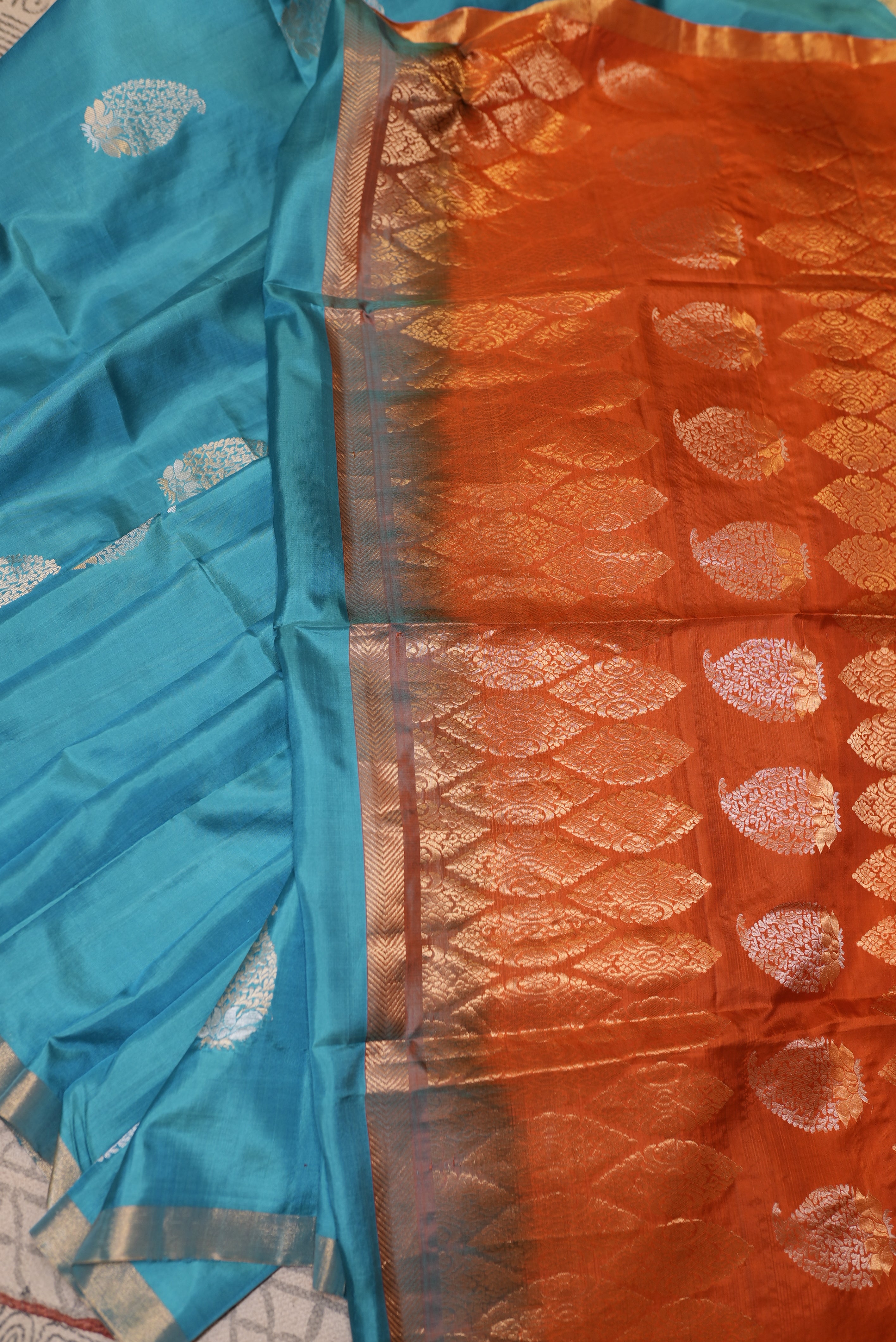 Sky blue with orange boarder kanjiwaram