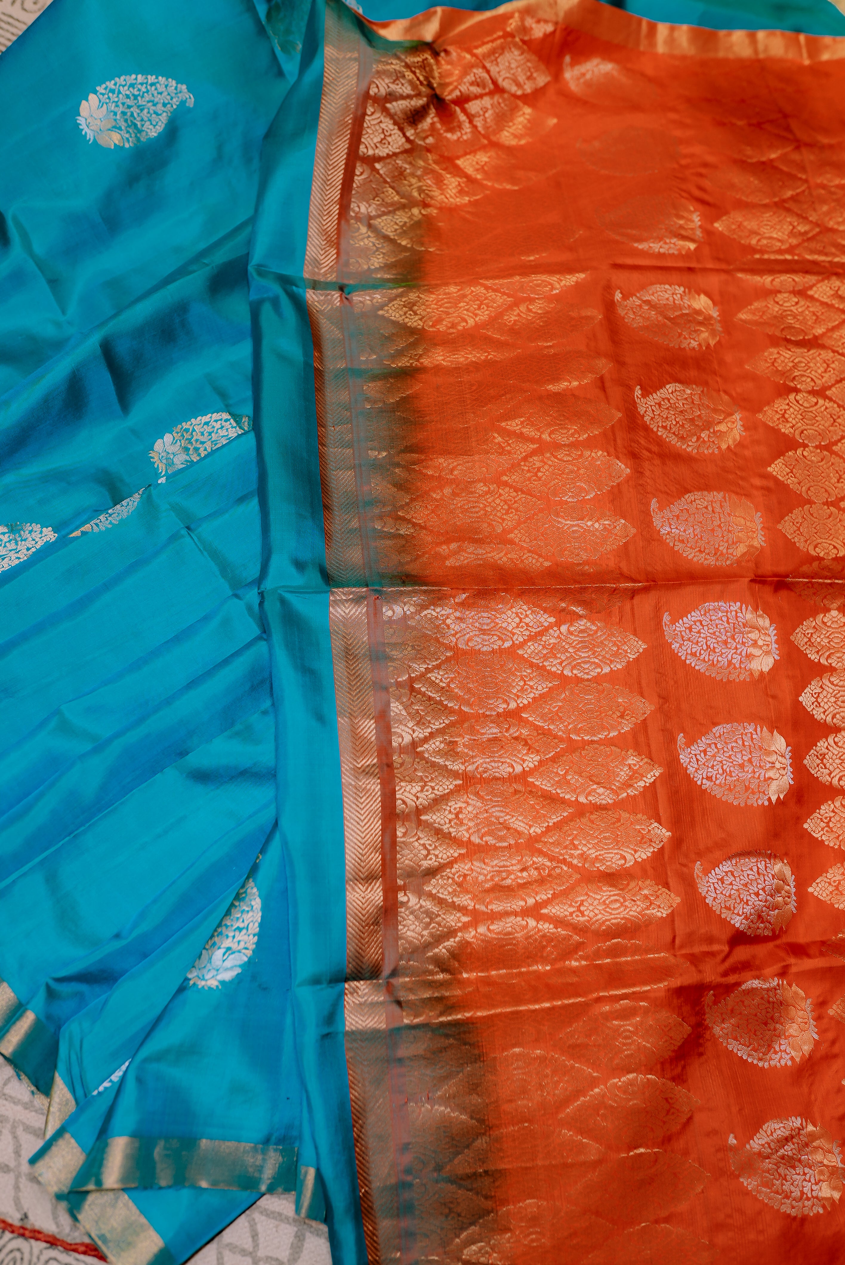 Blue with orange boarder banarasi