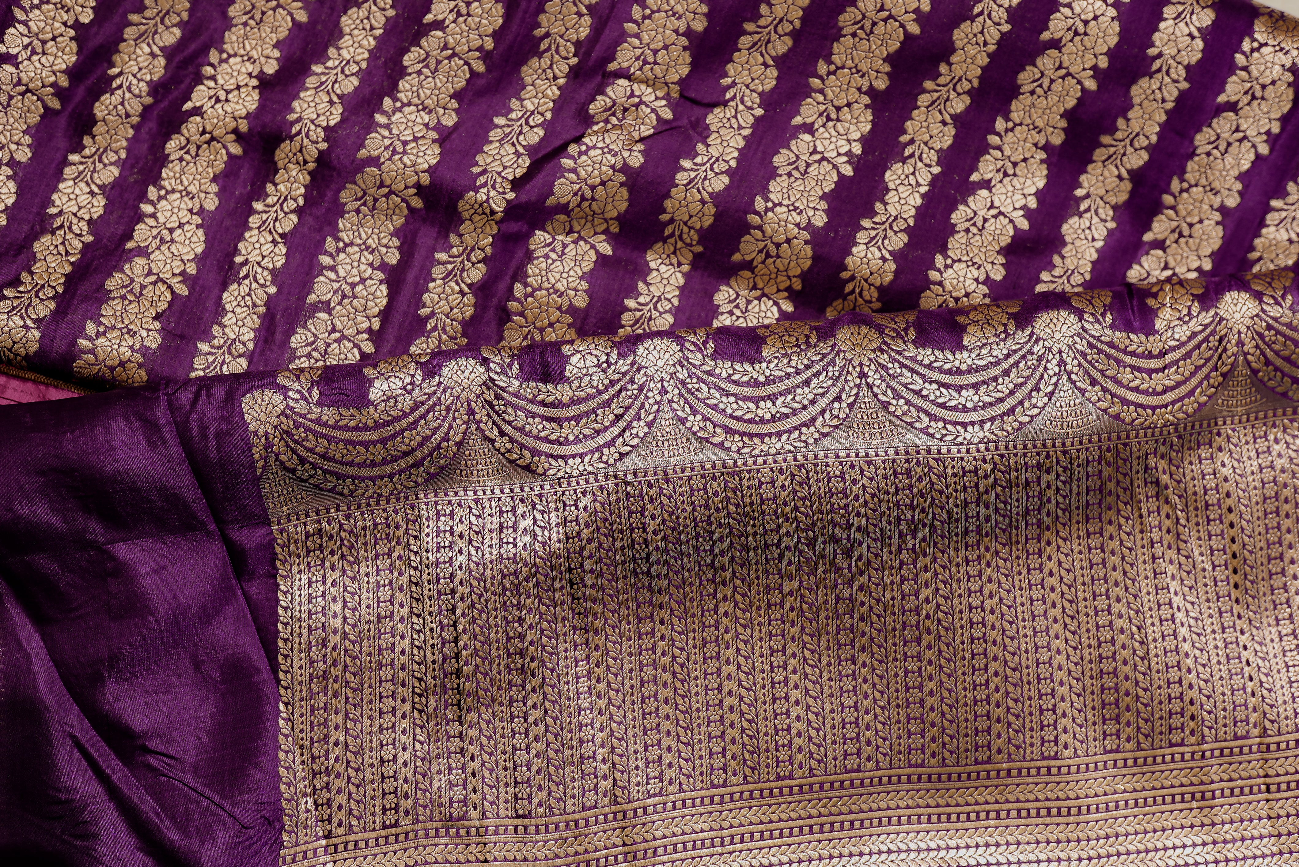 Purple banarasi saree with gold zari motifs and boarder