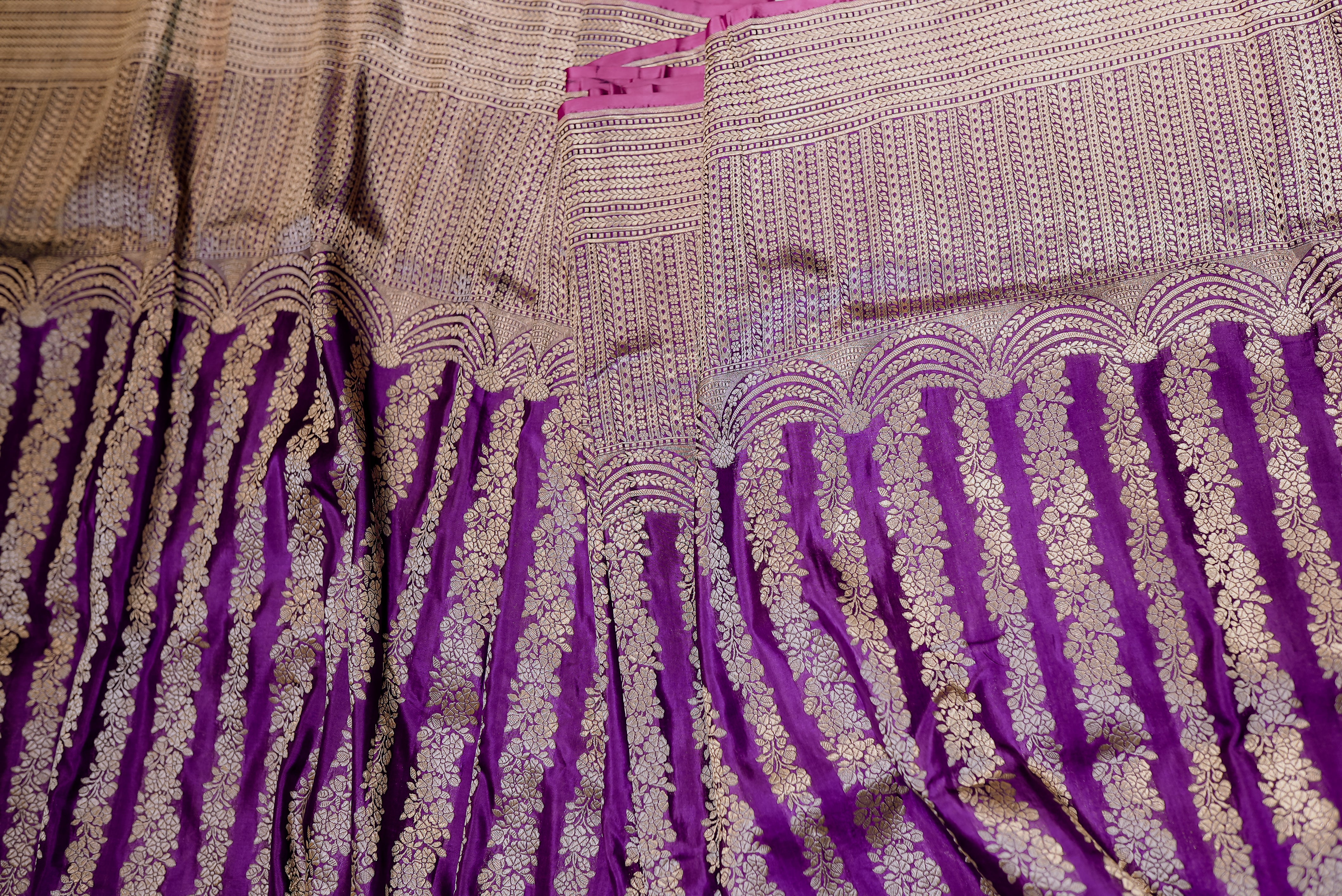 Purple banarasi saree with gold zari motifs and boarder