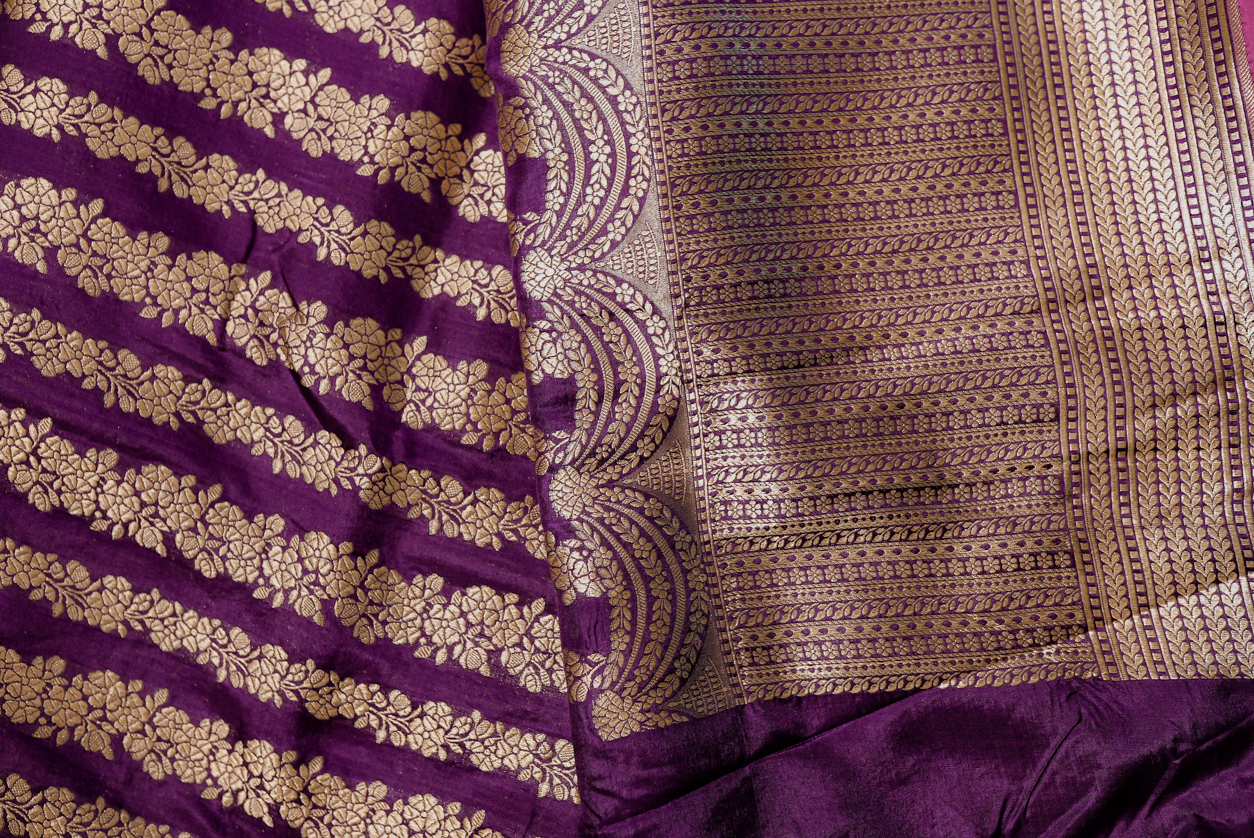 Purple banarasi saree with gold zari motifs and boarder