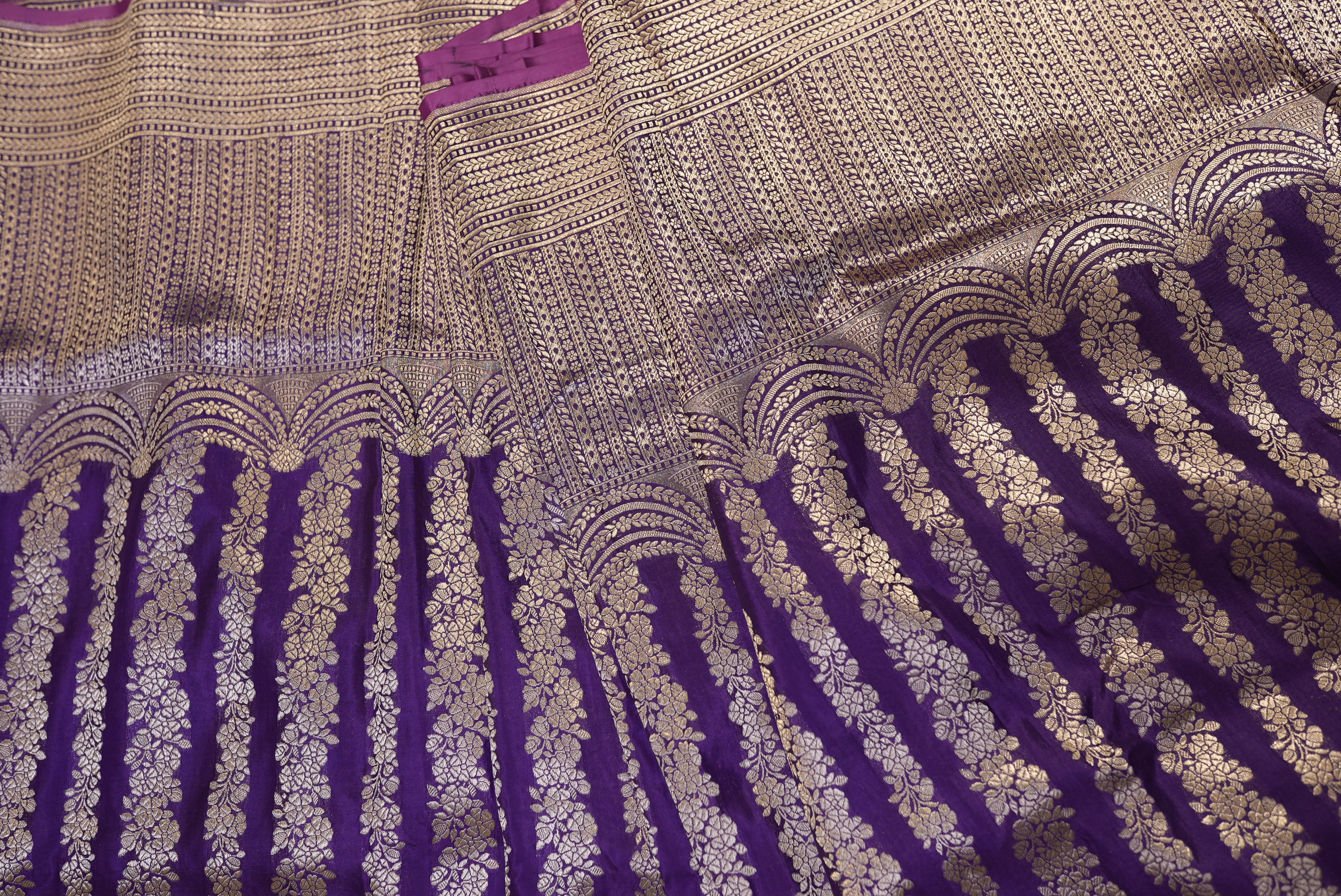 Purple banarasi saree with gold zari motifs and boarder