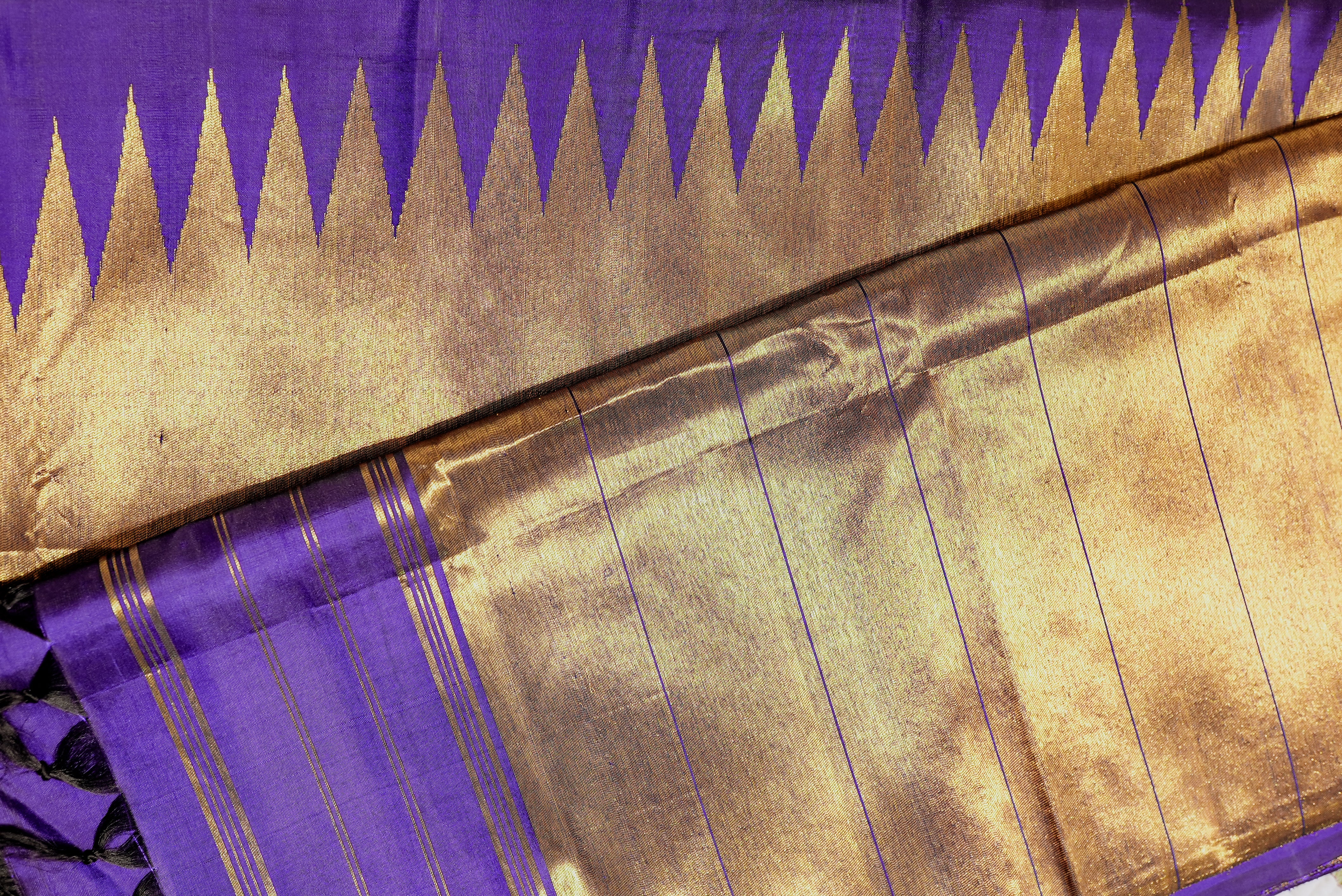 Purple kanjiwaram with golden rising boarder