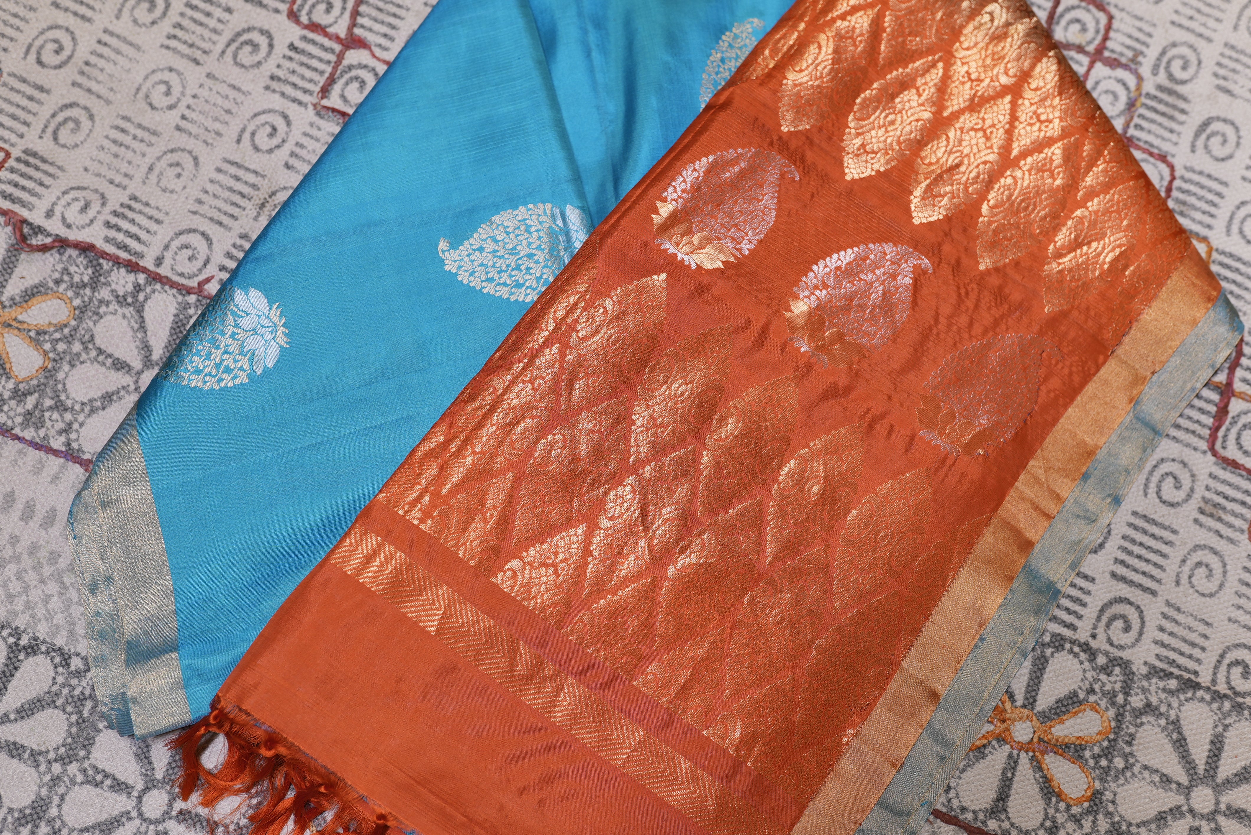 Sky blue with orange boarder kanjiwaram