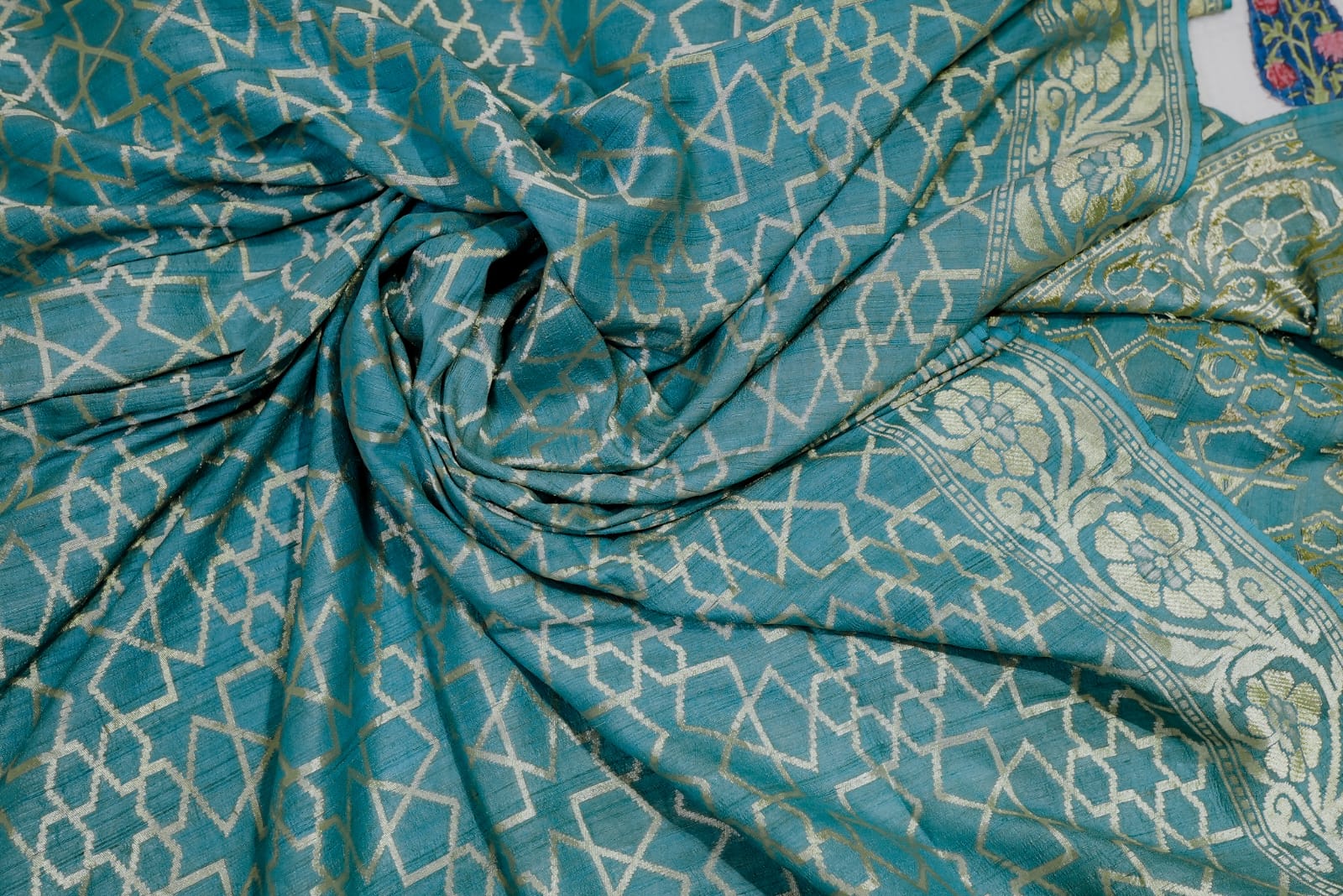 Blue tassar silk with beautiful zari floral boarder