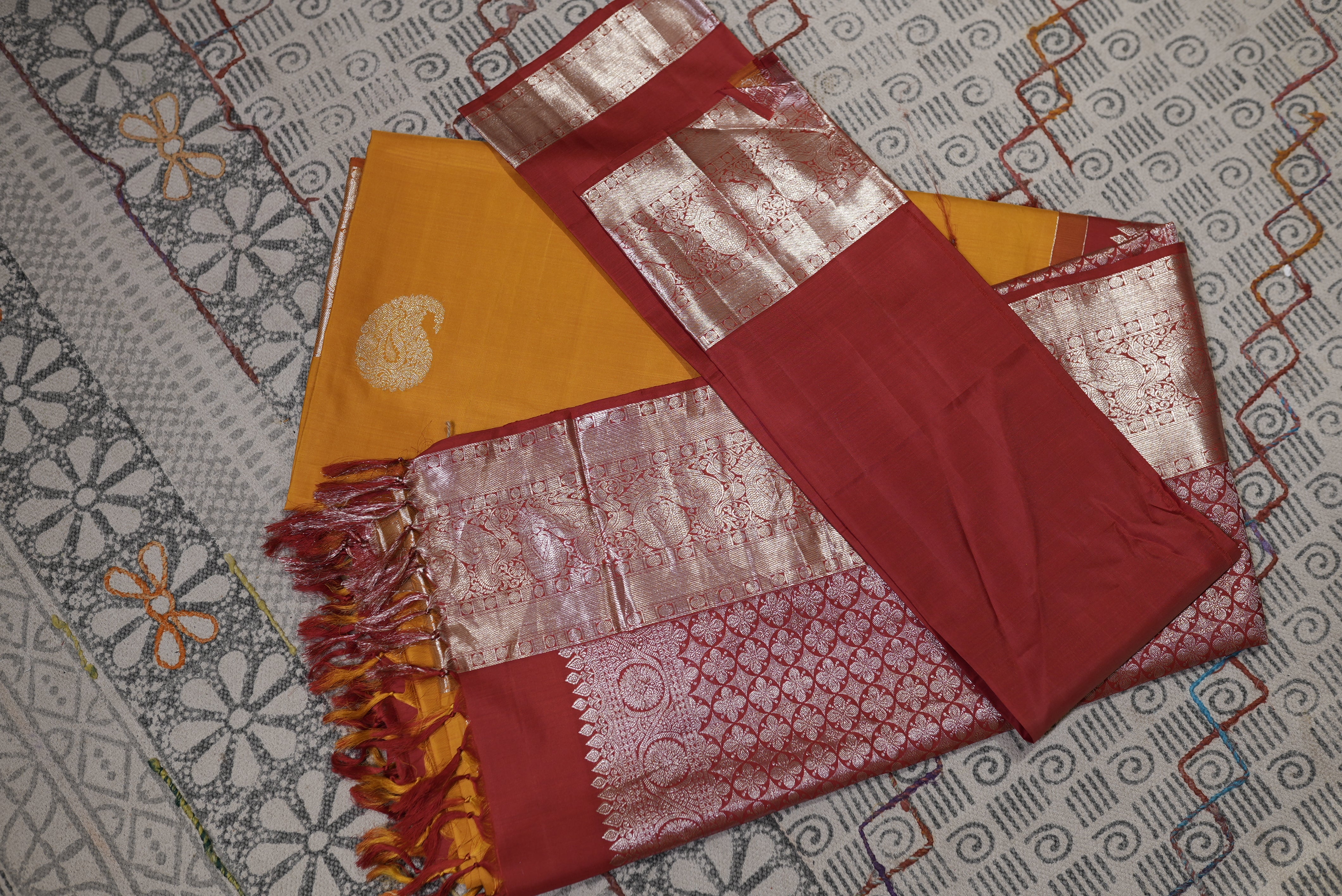 Yellow with red boarder kanjiwaram saree